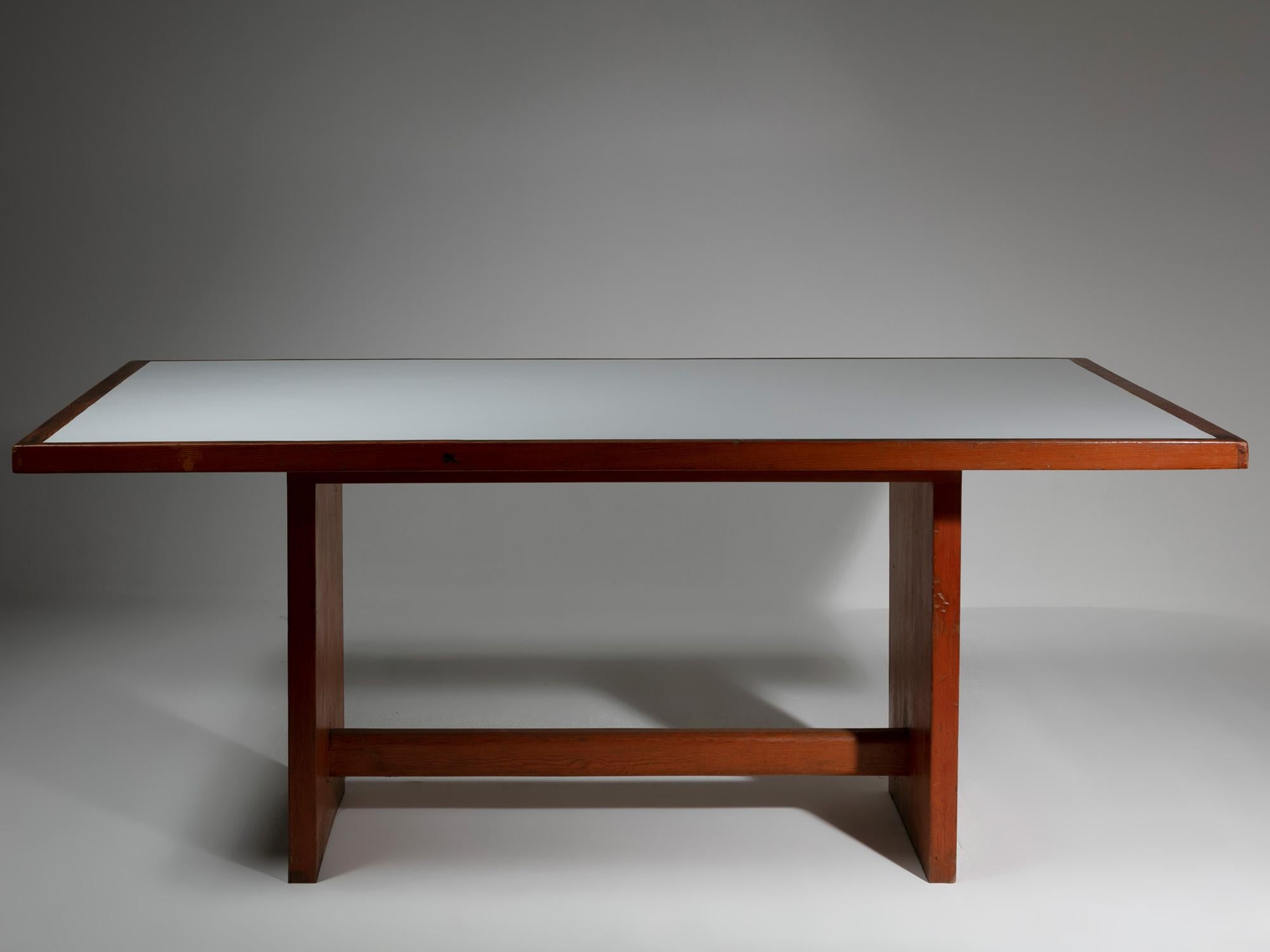 Rare custom made table by Mario Monti.
Italian late 60s rectangular table with white laminate top and wood borders.
This piece reminds Carlo Scarpa works with straight lines and beautiful constructions.