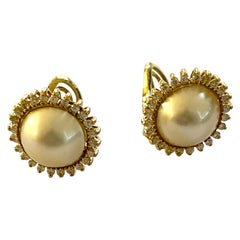 One Pair of 18 Karat Yellow Gold Earclips, Set with Mabe Pearl and Diamonds