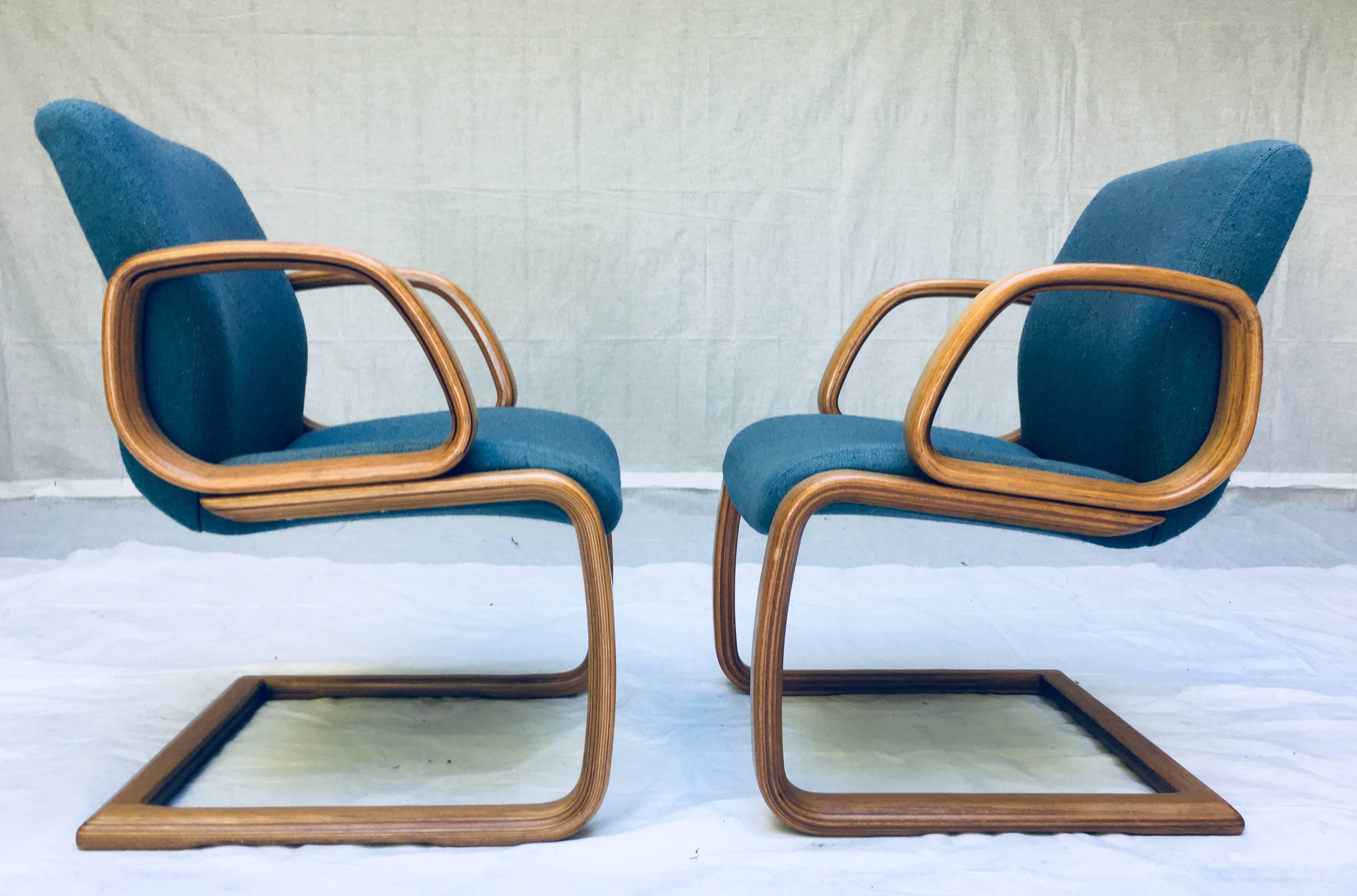 One pair of 1980s bent laminate arm chairs by Alba Industries.