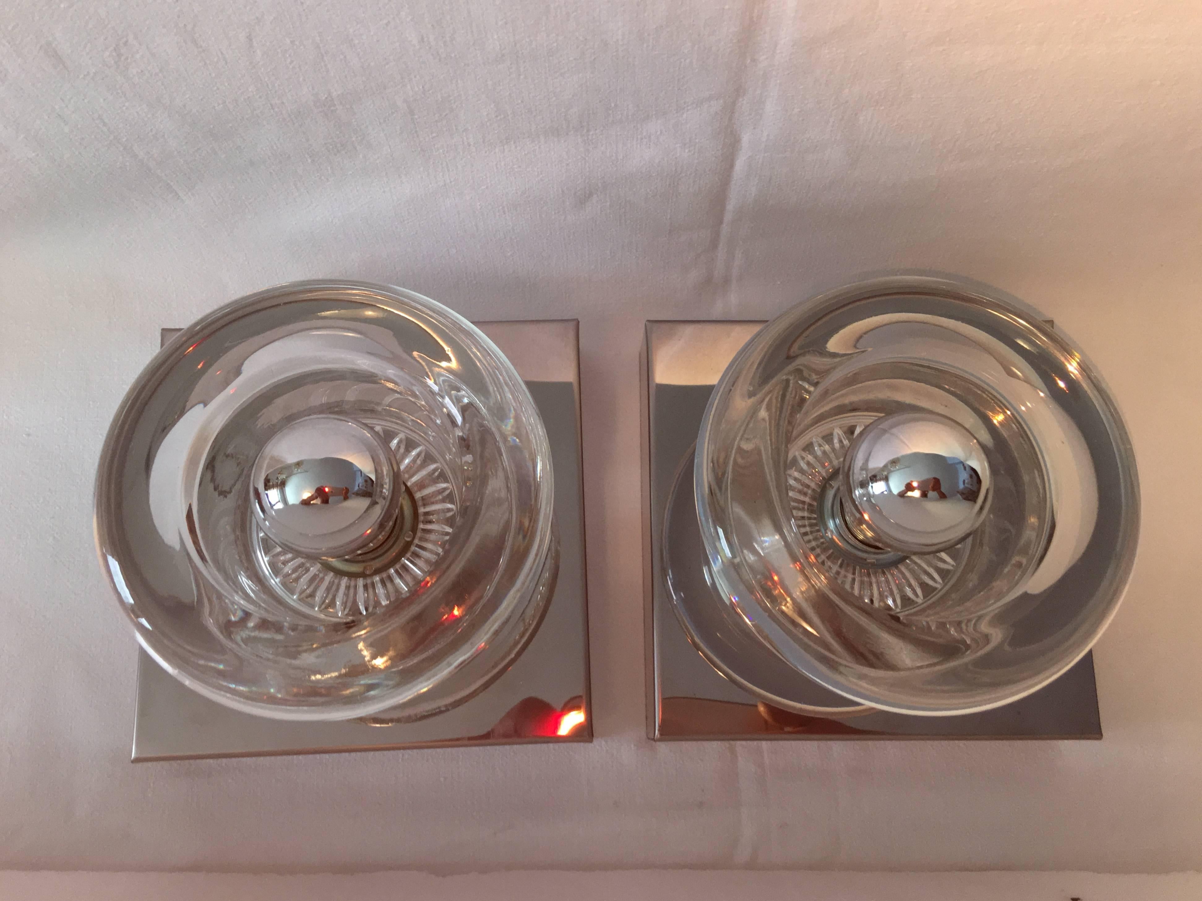 Chrome hardware and interior lights create a beautiful visual for this pair of glass sconces. each fixture requires one E14 European candelabra light bulb up to 40 watts.
Lovingly packaged in our European facility. It will be shipped directly to