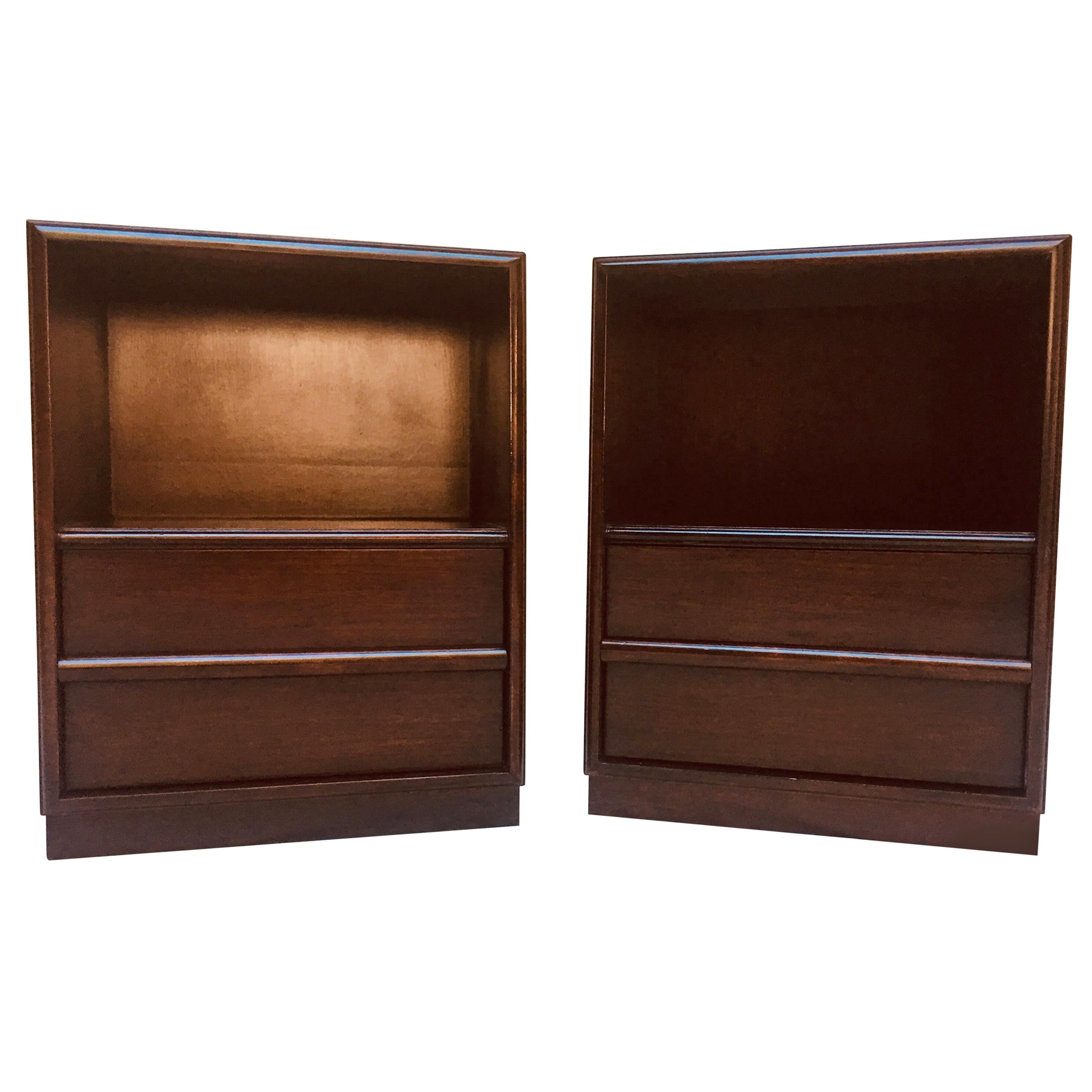 T.H. Robsjohn-Gibbingspair of nightstands designed by for Widdicomb, from the 1950s. 
The walnut nightstands are in their original Espresso lacquer that has been conserved not refinished and are in excellent vintage condition.
Please contact us if