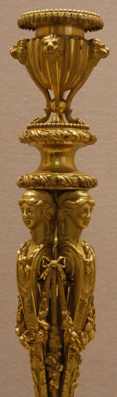 One Pair of Restauration Ormolu Candlesticks