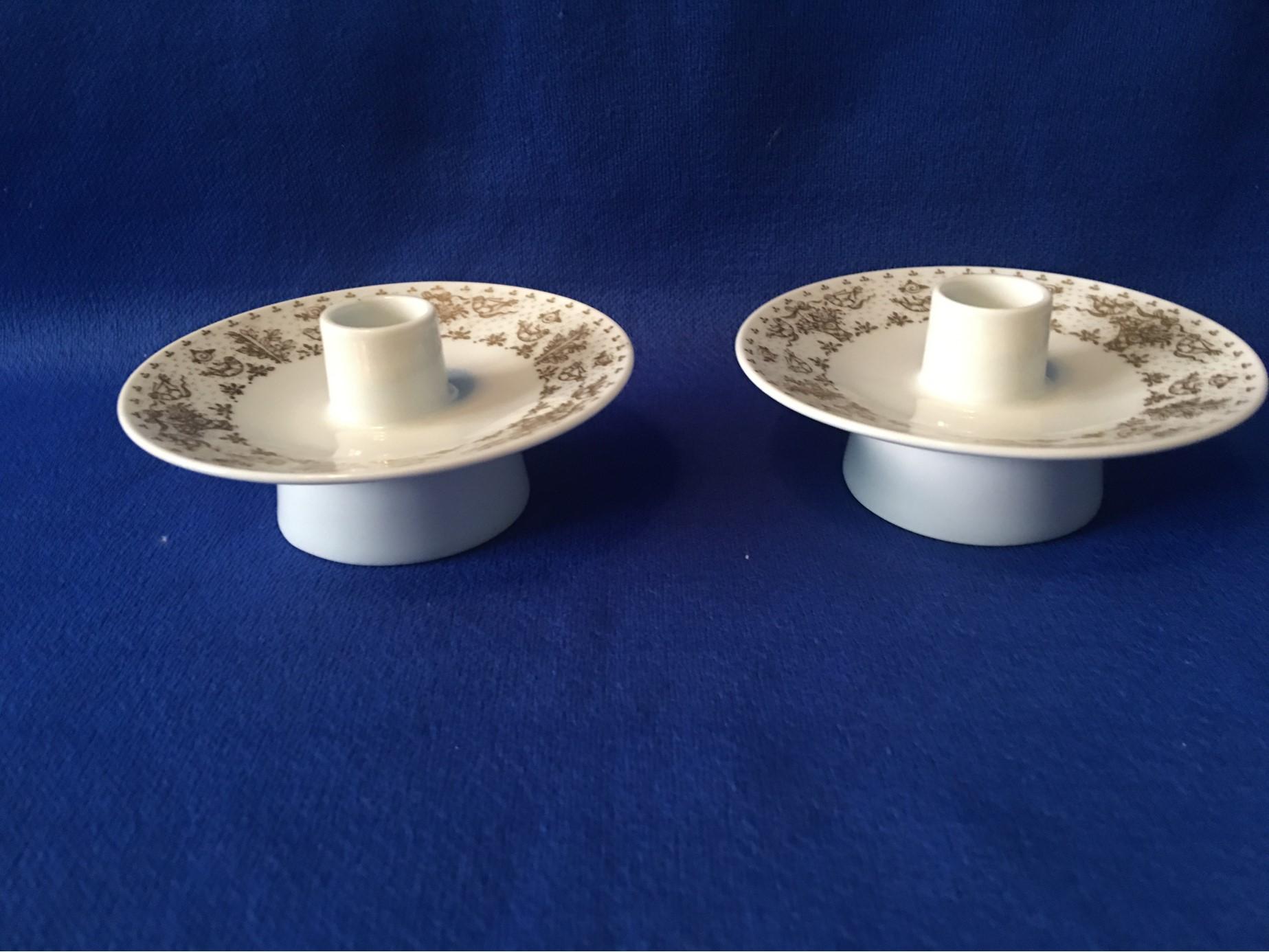 One lovely pair of candleholders made by the famous German Ceramic Company of Rosenthal based on the design by the renown Raymond Loewy. Beautiful set.