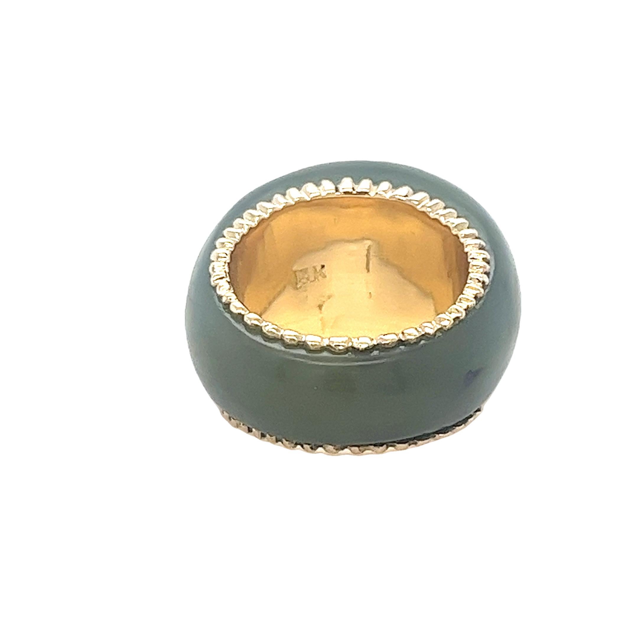 One-Piece Carved Jade Dome Ring with Yellow Gold Accents In Good Condition For Sale In Coral Gables, FL