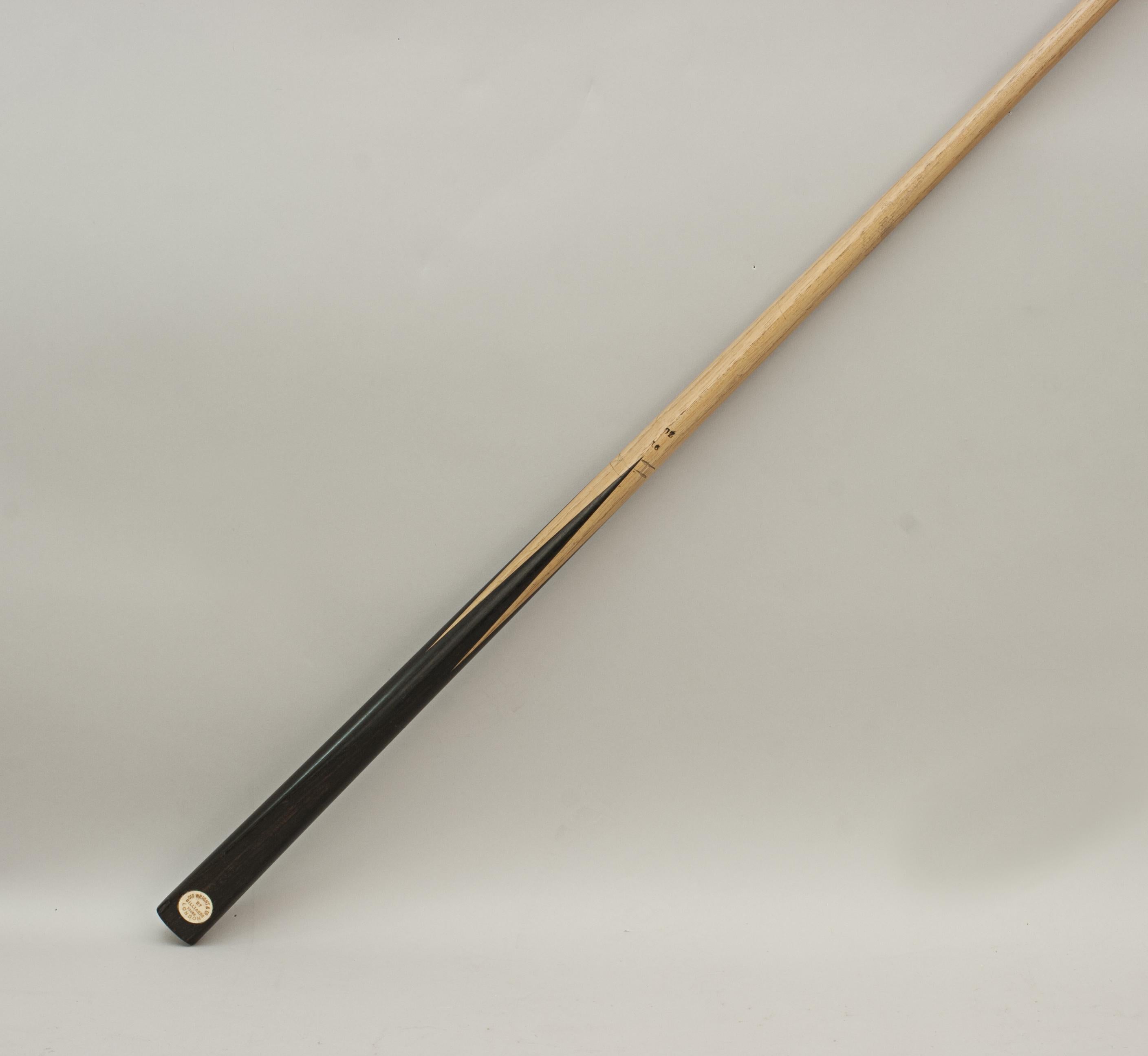 Geo. Wright & Co. Billiard Snooker Cue.
A 57 inch one piece billiard cue. The cue is made of ash with a spliced rosewood butt, the cue is stamped with the weight 16 oz. The butt is finished with an ivorine name disc, 'Geo. Wright & Co., London,