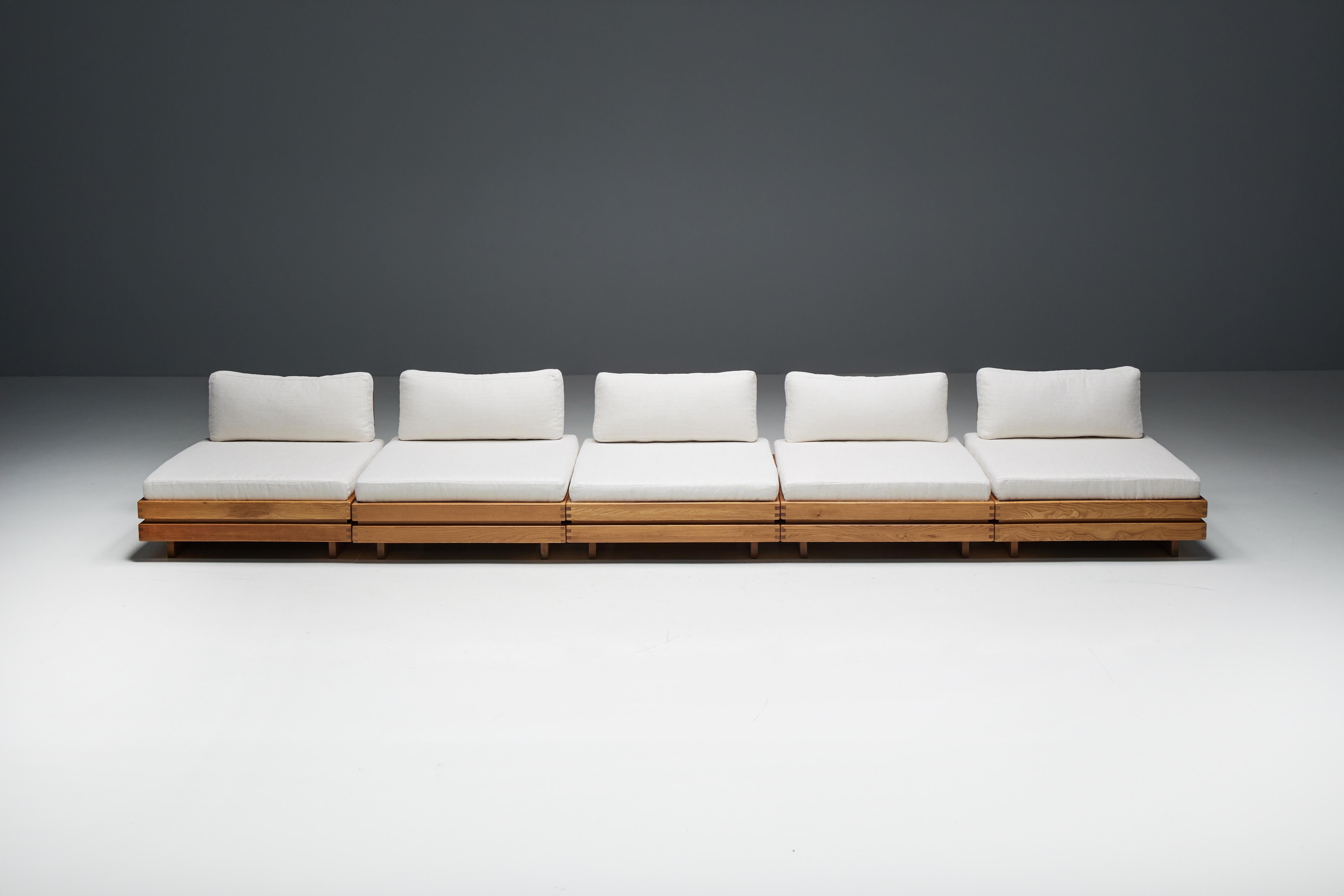 A rare find from 1970s France, this Maison Regain one-seater embodies timeless elegance with its sculptural elmwood frame and luxurious ecru linen-blend upholstery. Designed for versatility and comfort, this chair seamlessly blends into any