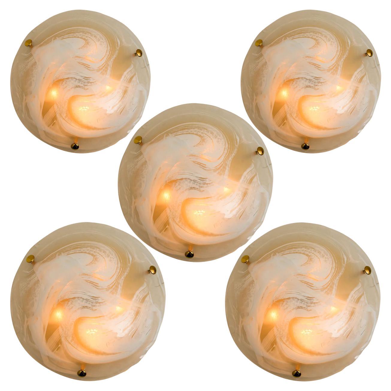 One of the two high quality modern thick textured ice glass flush mount or wall lights by Hillebrand, circa 1965. 

Each light fixture is featuring a huge round blown glass dish. Can work as impressive wall lights but also as flush mounts.
Two