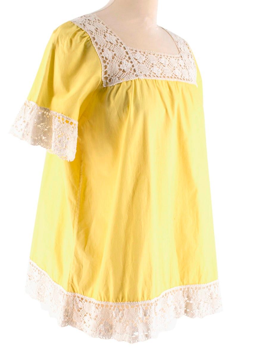 One Vintage Crochet Trimmed Yellow Top

-Crochet detailing by sleeves, neck and bottom of t-shirt
-Soft material
-Loose fitting

Machine Washed

All measurements are taken seam to seam:
Shoulders- 37cm
Sleeves- 30cm
Chest- 53cm
Waist-57cm
Length-