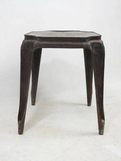 Un tabouret vintage de la marque Fibrocit, datant des années 1950 environ
