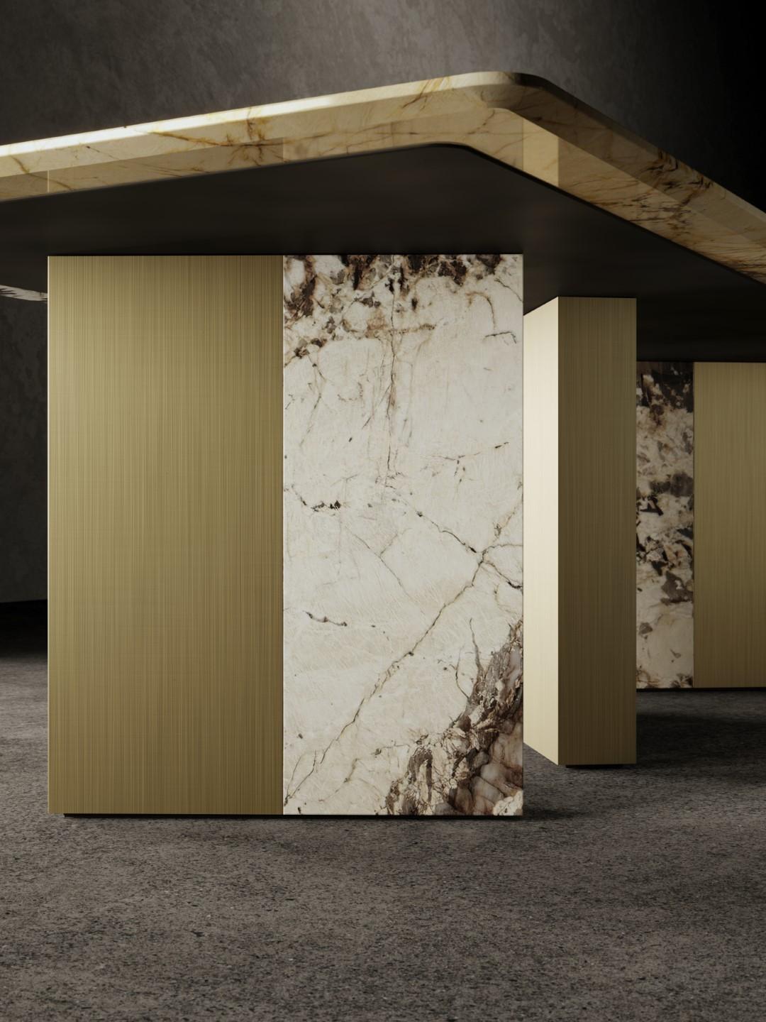 One Way Or Another dining table is composed of a top in Patagonia marble with diamond-cut on the lower edge, reinforced by a metal support fixed to three asymmetrical legs. 
Each leg is covered with a different combination of Patagonia marble slabs