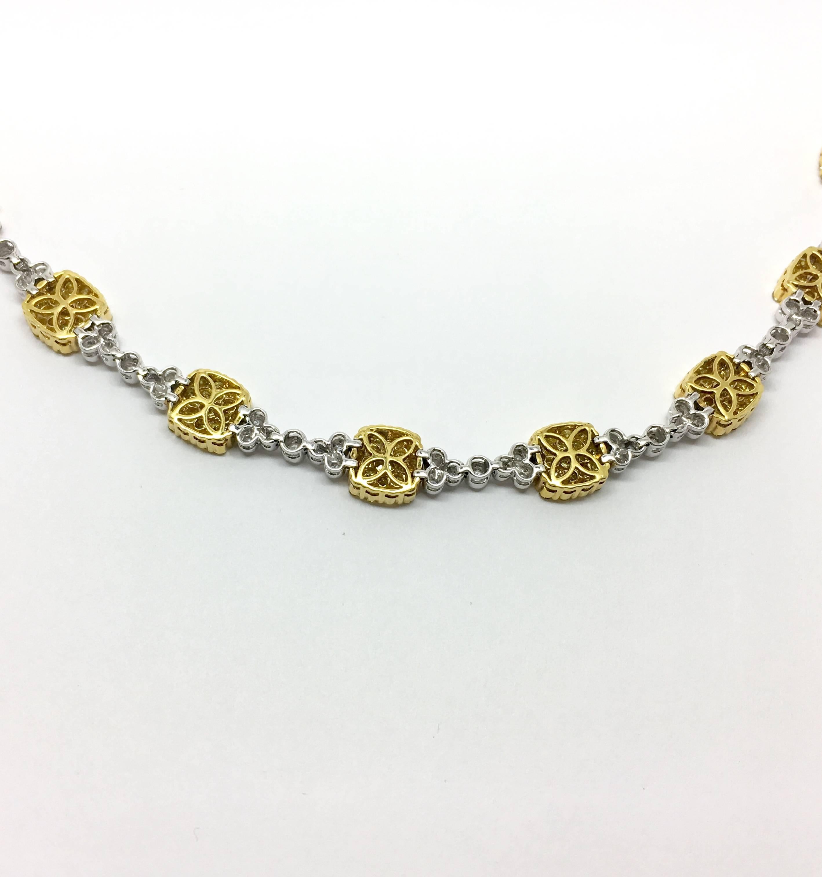 One 18 karat white and yellow gold cushion shape style fancy diamond necklace. This piece  contains 63 round brilliant diamonds 1.50 total carat weight and 189 enhanced yellow diamonds with a total weight of 6.10 carat total weight.

*photo 5:
