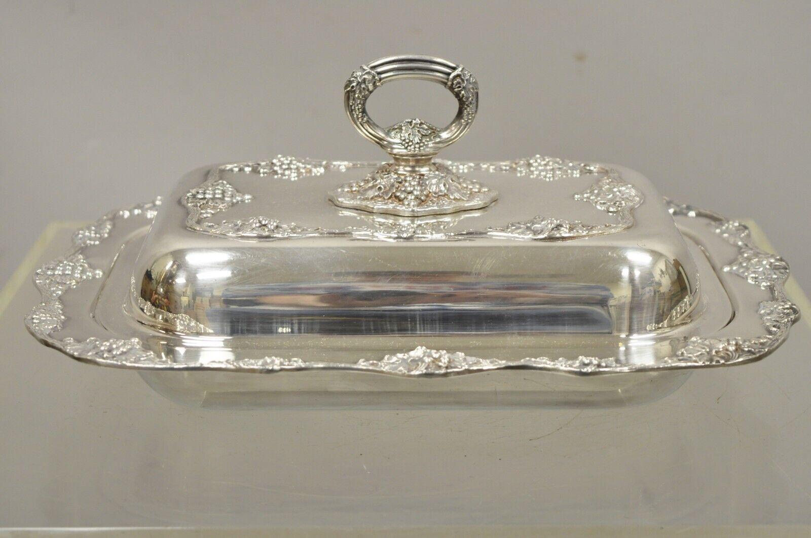 Oneida silver plated grape vine Regency style covered serving dish. Item features a grape and vine decoration, covered with lid, original stamp, quality craftsmanship. Circa mid 20th century. Measurements: 5.5