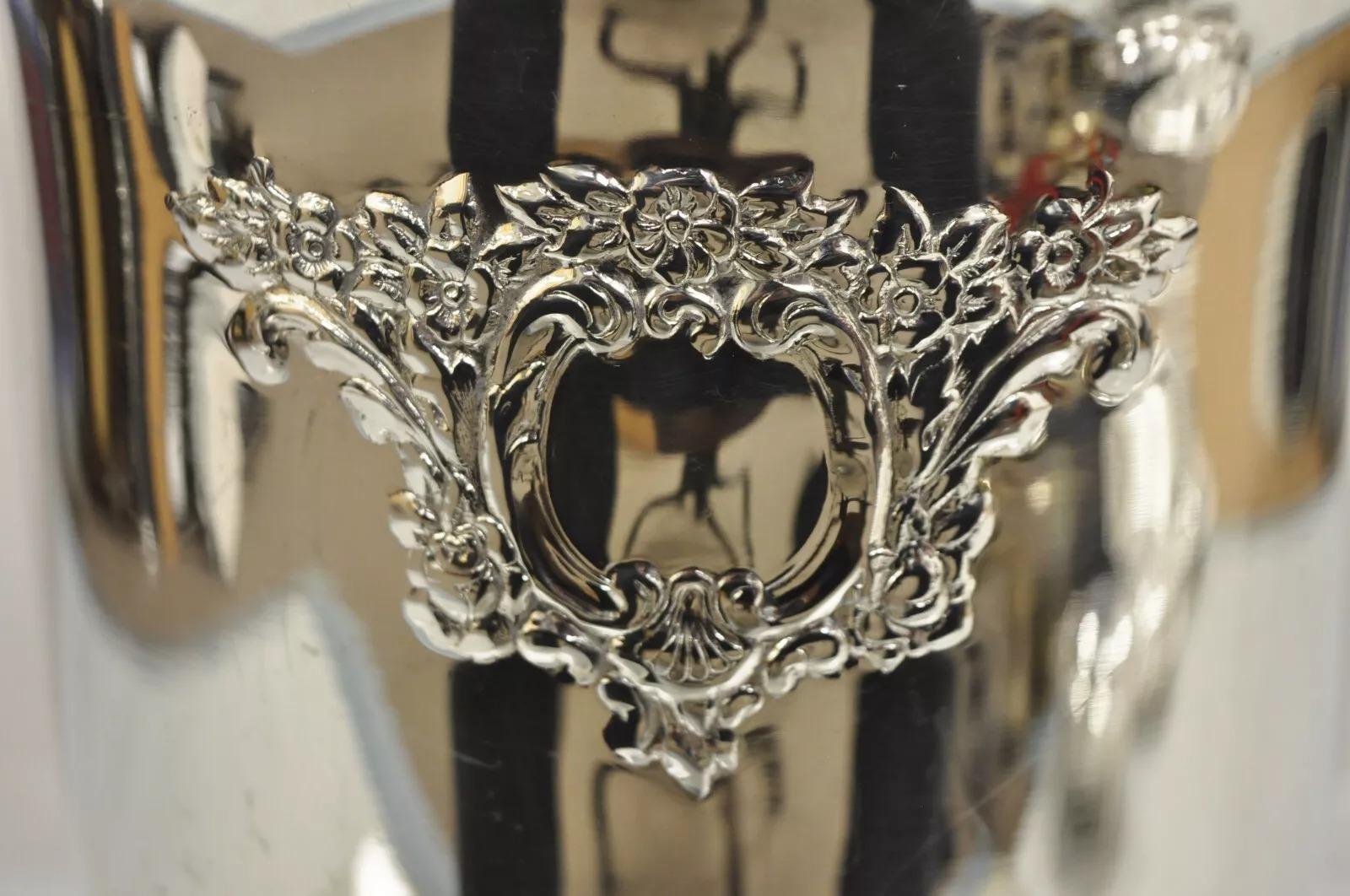 Oneida Victorian Style Silver Plated Embossed Fluted Champagne Chiller Ice Bucket. Circa Late 20th Century. Measurements: 9.25