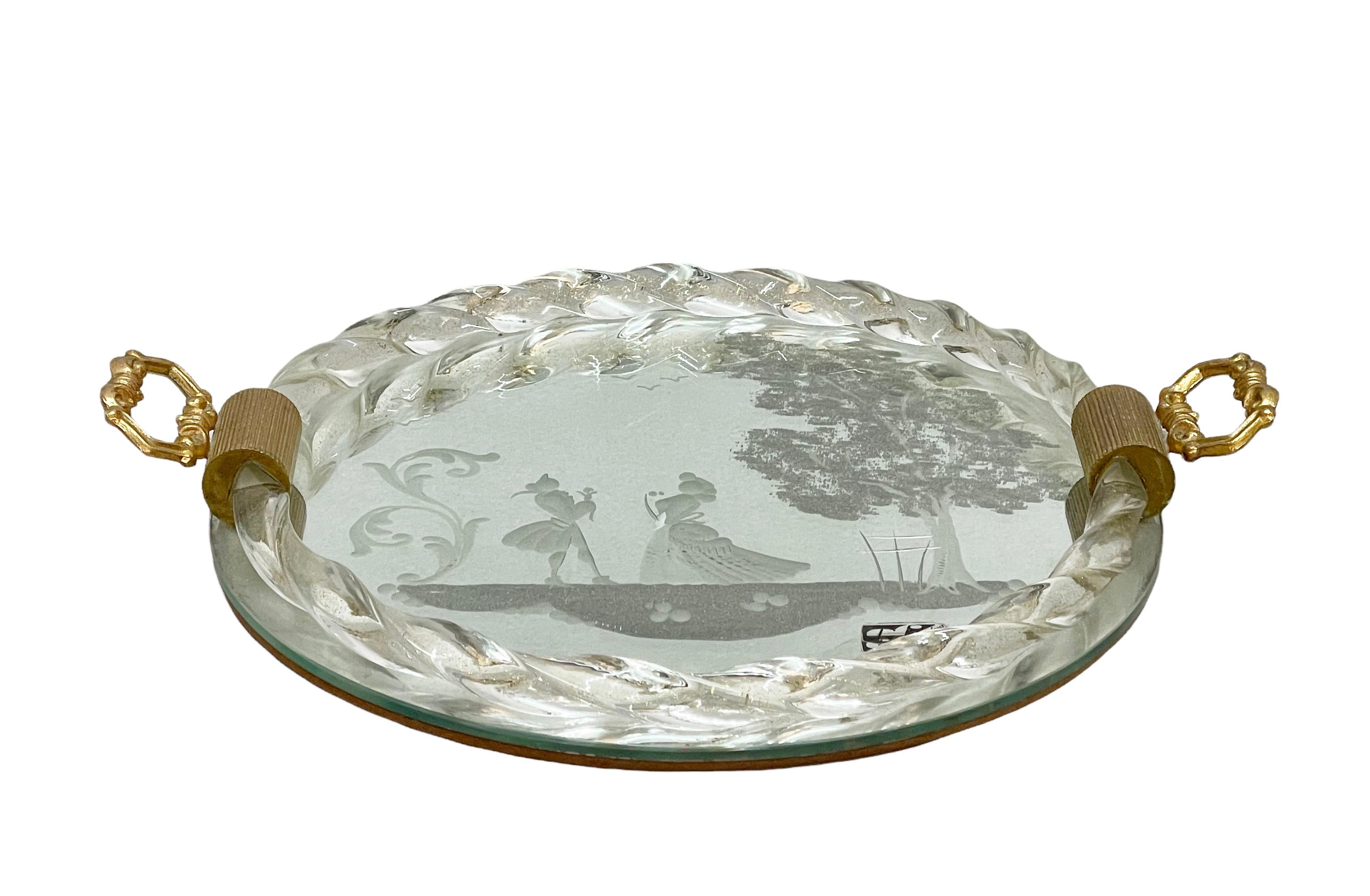 Midcentury serving tray in engraved mirror and Murano glass with gilded handles. Ongaro e Fuga designed this excellent piece in Italy, Murano island, during the 1950s. This fantastic item comes with the original label.

This remarkable object is a