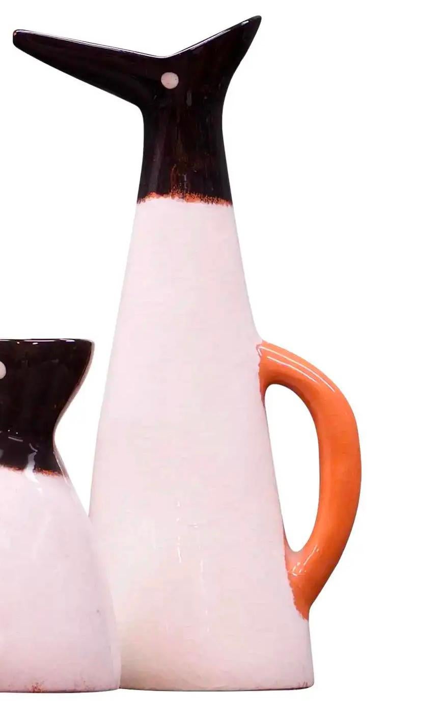 One  large bird pirtcher sold in this listing. One Early Edmund Ronaky for Jaru of Callfornia sea bird vessels, iconic midcentury Southern California design. 
Large W 6 x D 4.75 x H 14.5 in.

Measures: Small W 7.5 x D 5 x H 7.5 in. (SMALL NOT