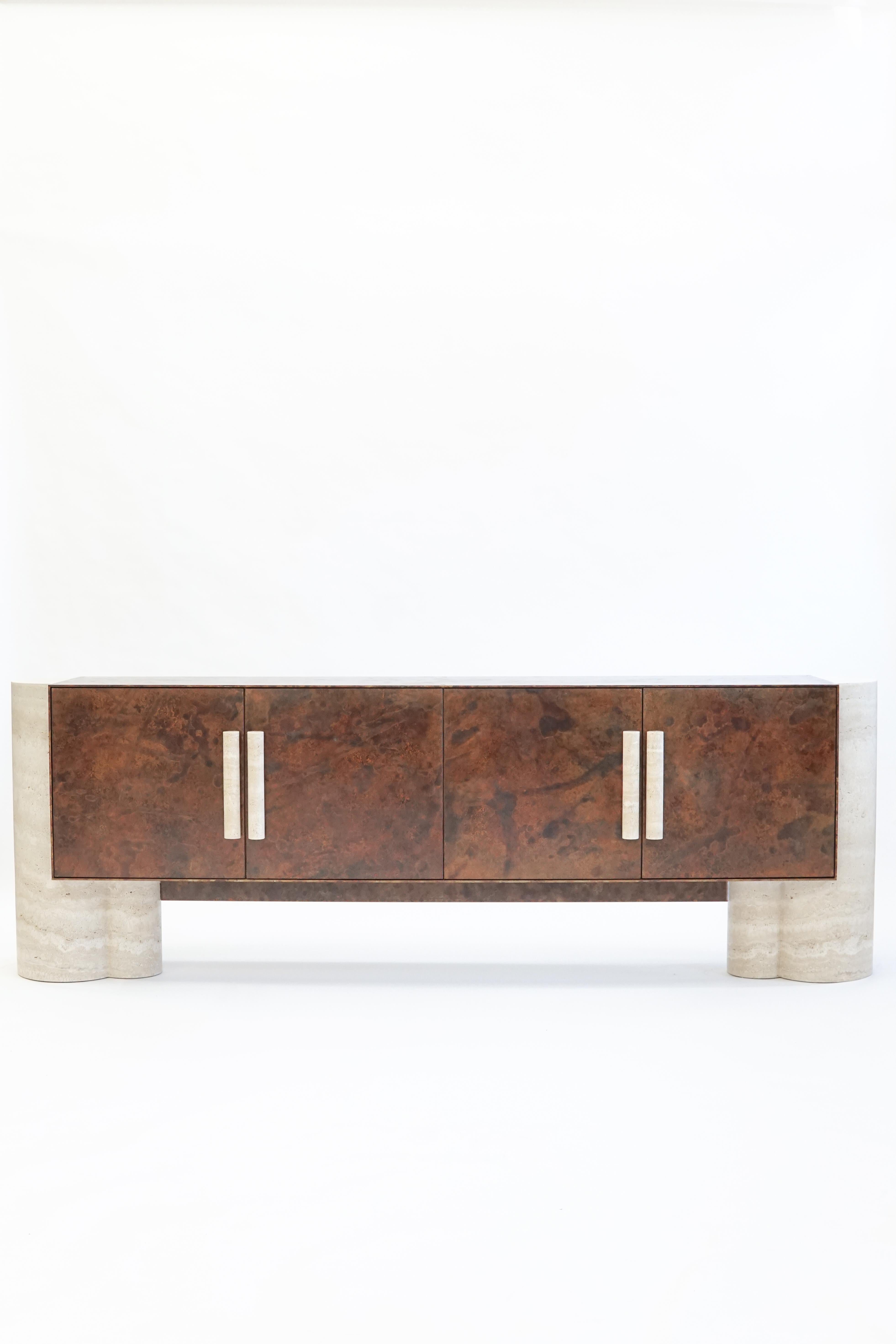 Onna credenza by Swell Studio
Dimensions: W209 x D36 x H72 cm
Material: Shown in alabastrino travertine, SS house patina’d steel exterior, walnut interior (Available in variety of finish options.) 


The Onna credenza is a nod to the elevated