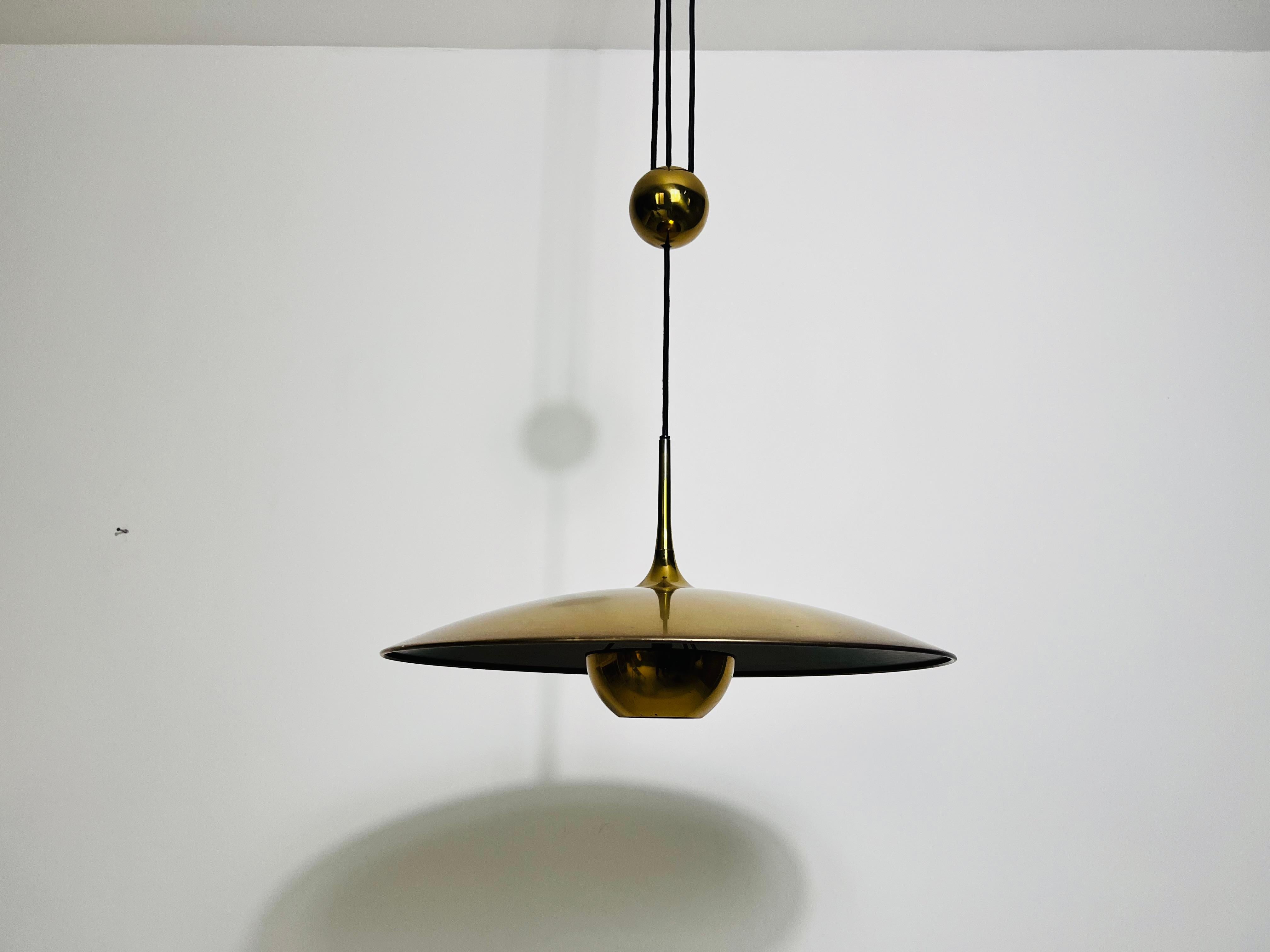 Mid-Century Modern 'Onos 55' Brass Pendant Lamp with Counterweight by Florian Schulz, 1970s Germany
