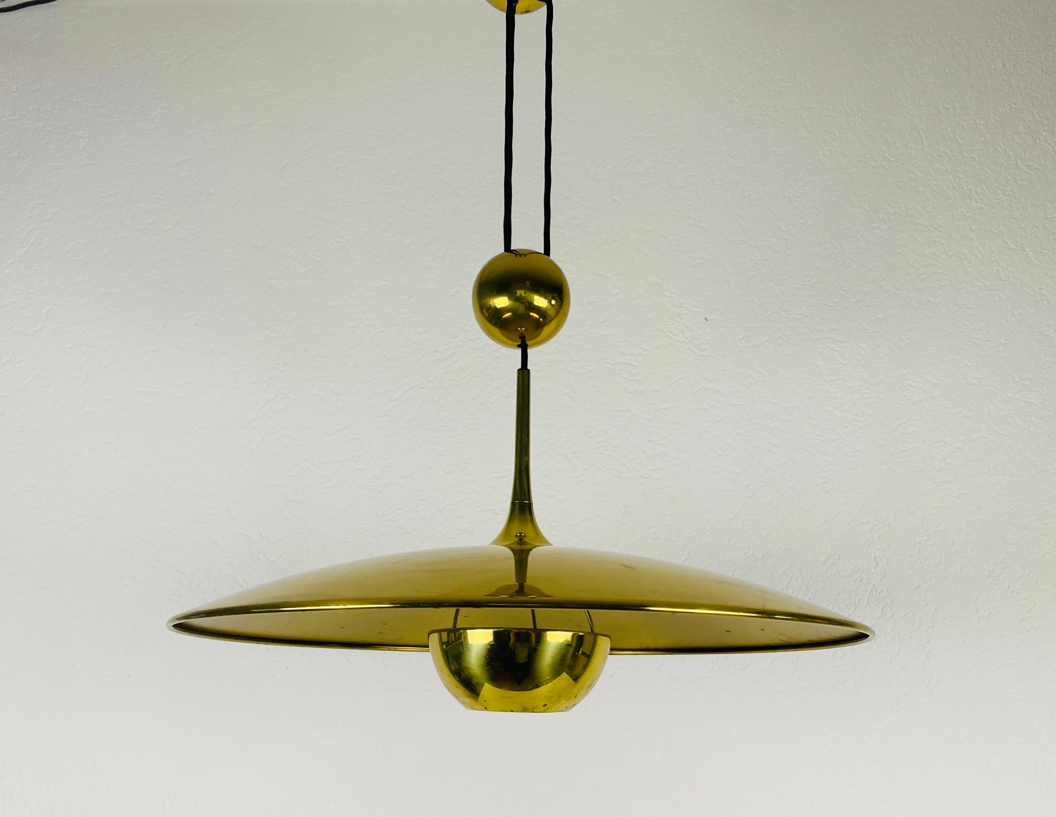 'Onos 55' Brass Pendant Lamp with Counterweight by Florian Schulz, 1970s Germany 1