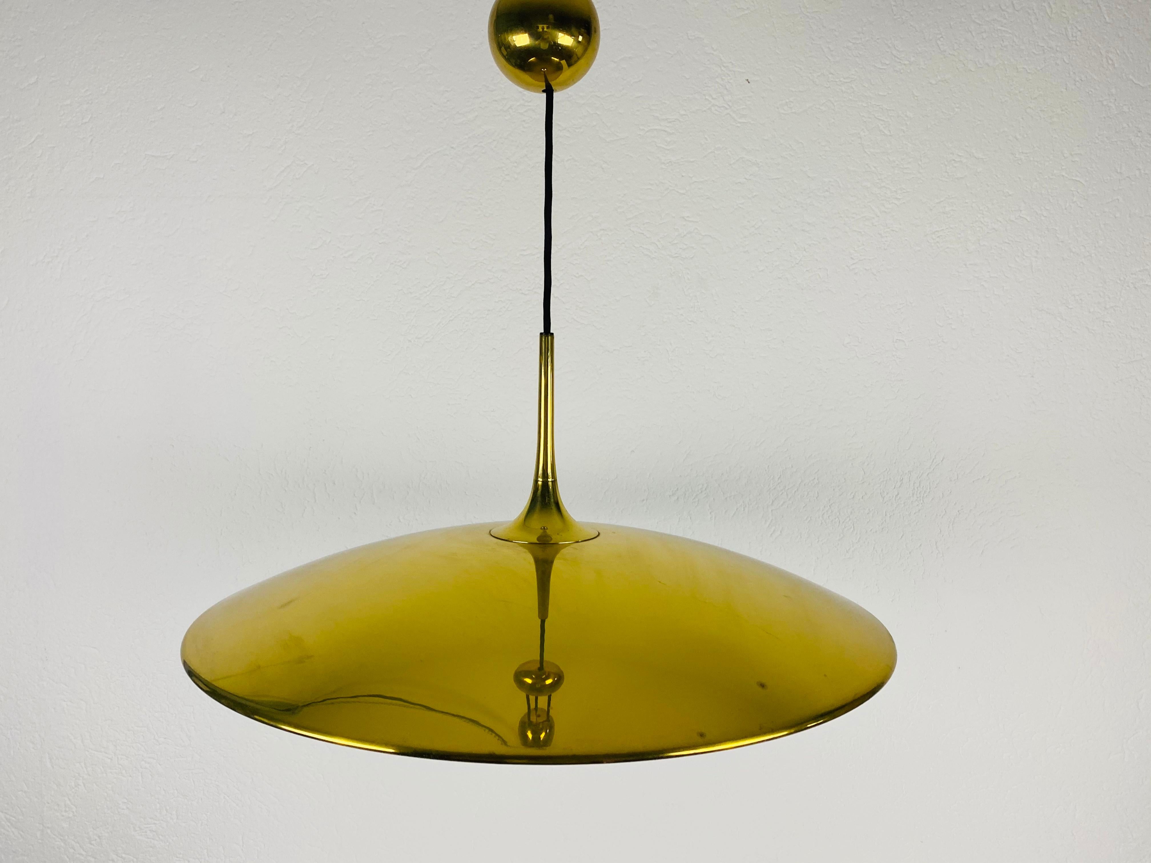'Onos 55' Brass Pendant Lamp with Counterweight by Florian Schulz, 1970s Germany 2