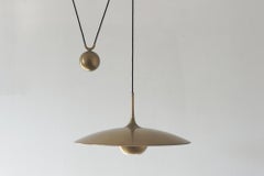 Onos 55 Counterbalance Pendant Lamp in Brass by Florian Schulz
