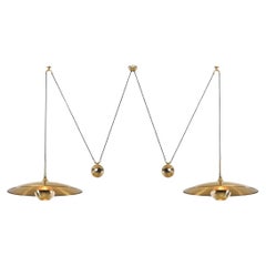 Onos 55 Double Counterbalance Lamps in Brass by Florian Schulz