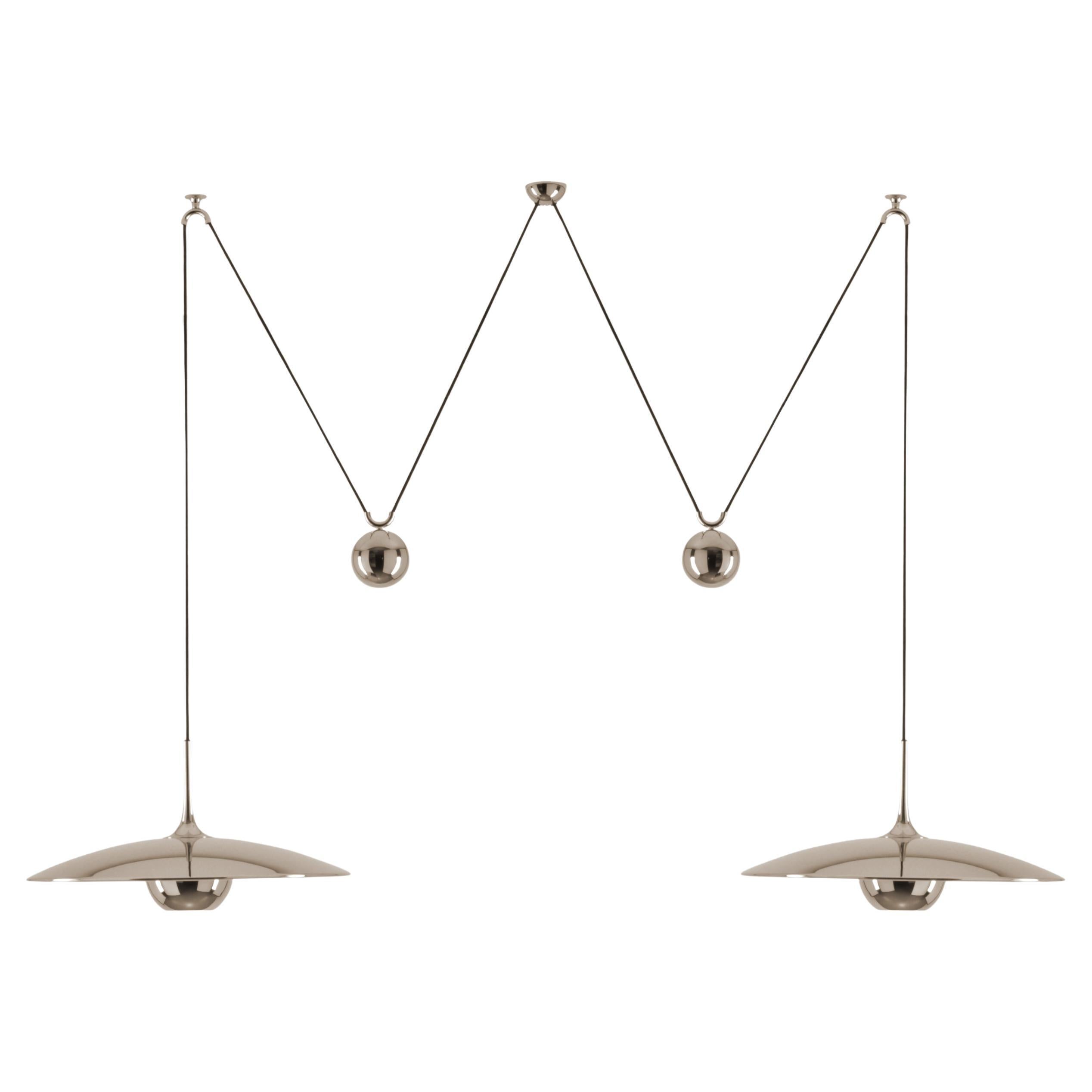 Onos 55 Double Counterbalance Lamps in Brass by Florian Schulz