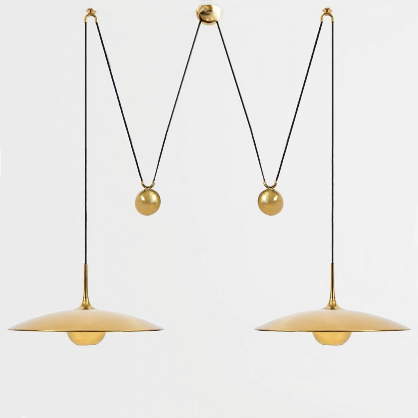 Onos 55 Double Pull Brass Pendant Lamp by Florian Schulz, Germany In Good Condition In Rijssen, NL