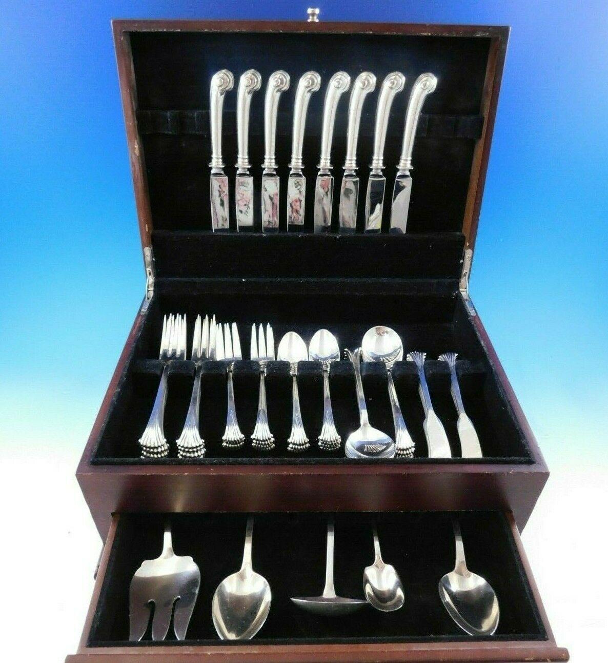 Onslow by Tuttle sterling silver flatware set, 53 pieces. This set includes:

8 regular knives, pistol grip, 8 3/4