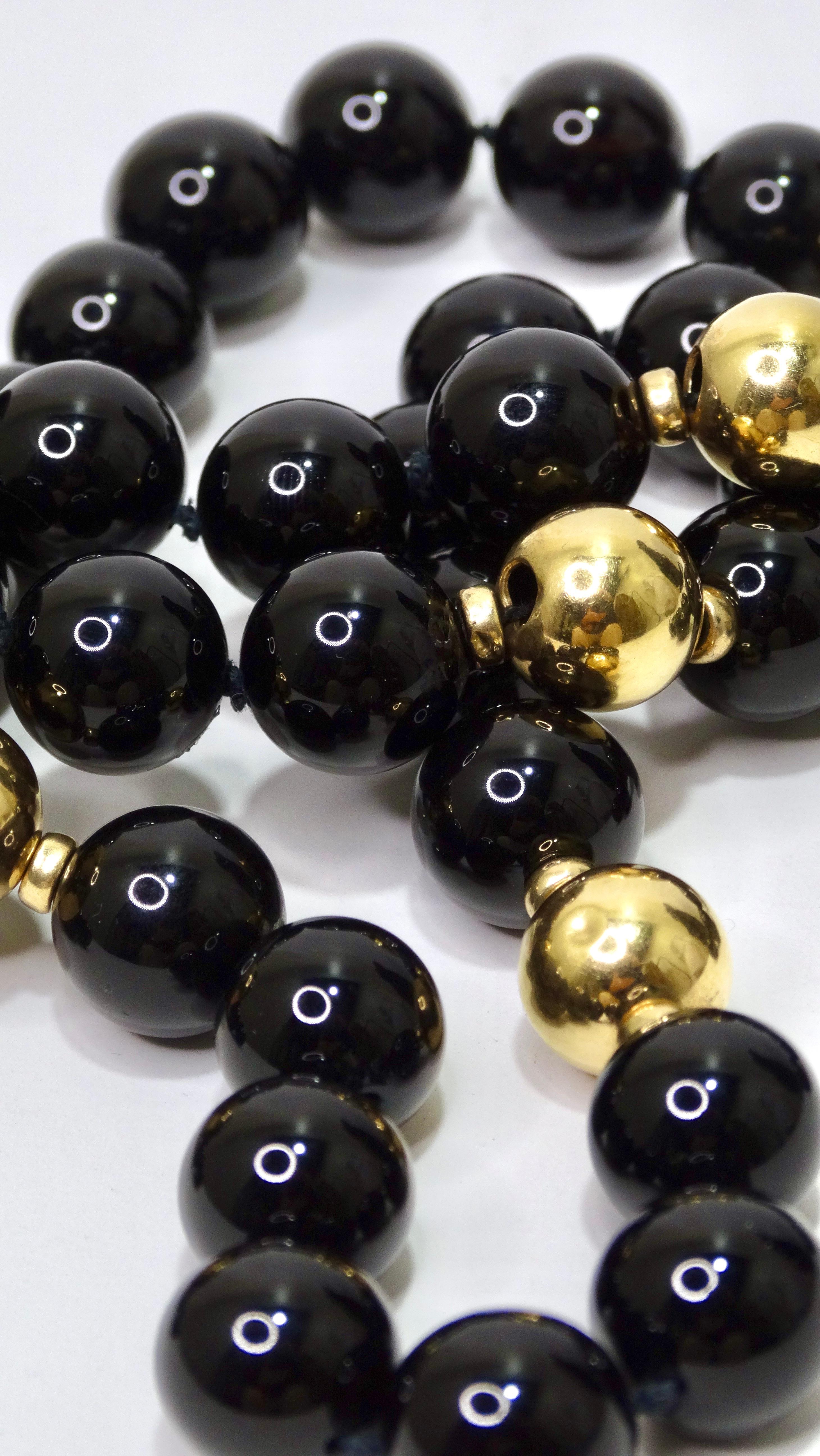This crafted necklace is made of a mix of black Onyx and 14k gold that contrasts beautifully. A beaded necklace has many possibilities for styling as it can be styled as a single-layer or double-layer. Wear with a vintage Prada maxi dress and some