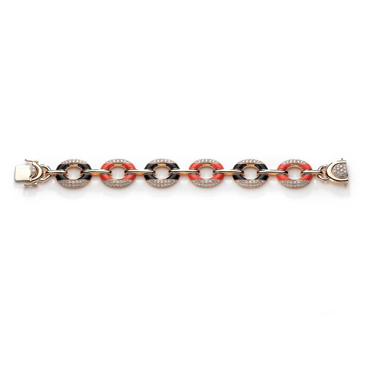Bracelet in 18kt yellow gold set with 440 diamonds 3.01 cts, 10 onyx 6.74 cts and 10 coral 21.83 cts