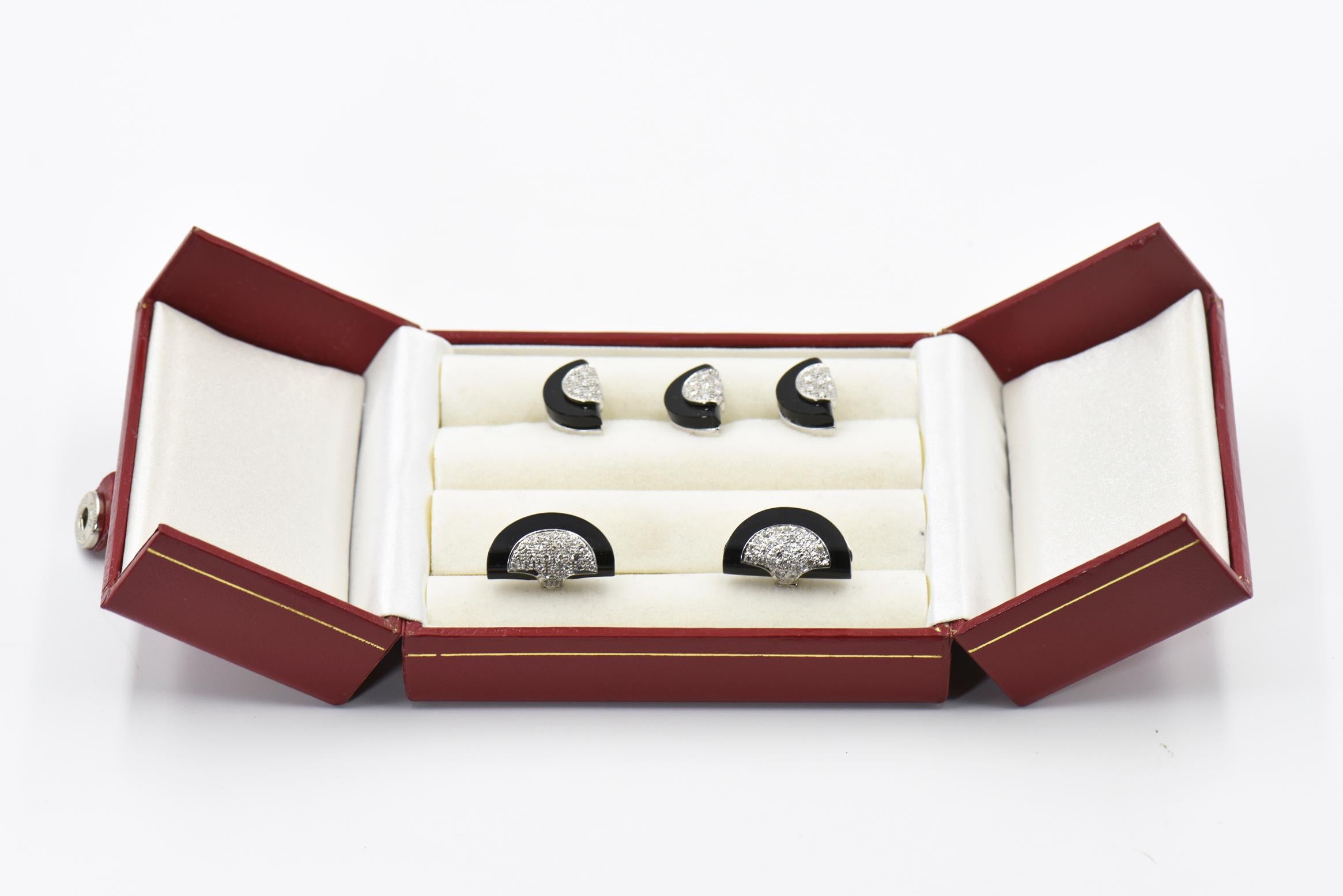 Stunning stud set featuring diamond half circle set on top of an onyx half circle mounted in 14k white gold. The set has a pair of cufflinks and 3 studs.  The cufflinks have a 