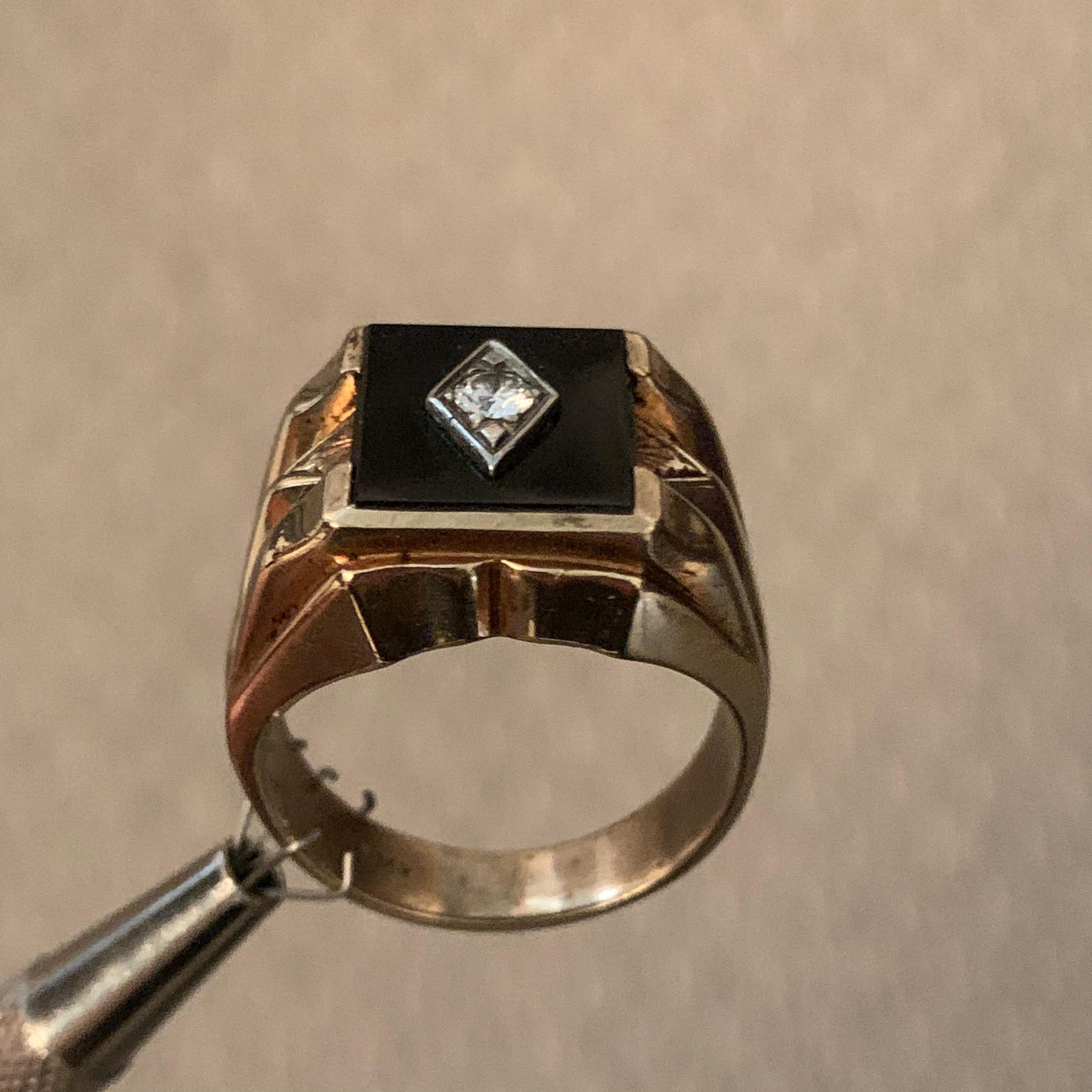 Onyx and Diamond RIng, 3.5mm Diamond

Size 11.75 Finger Size can be sized



 