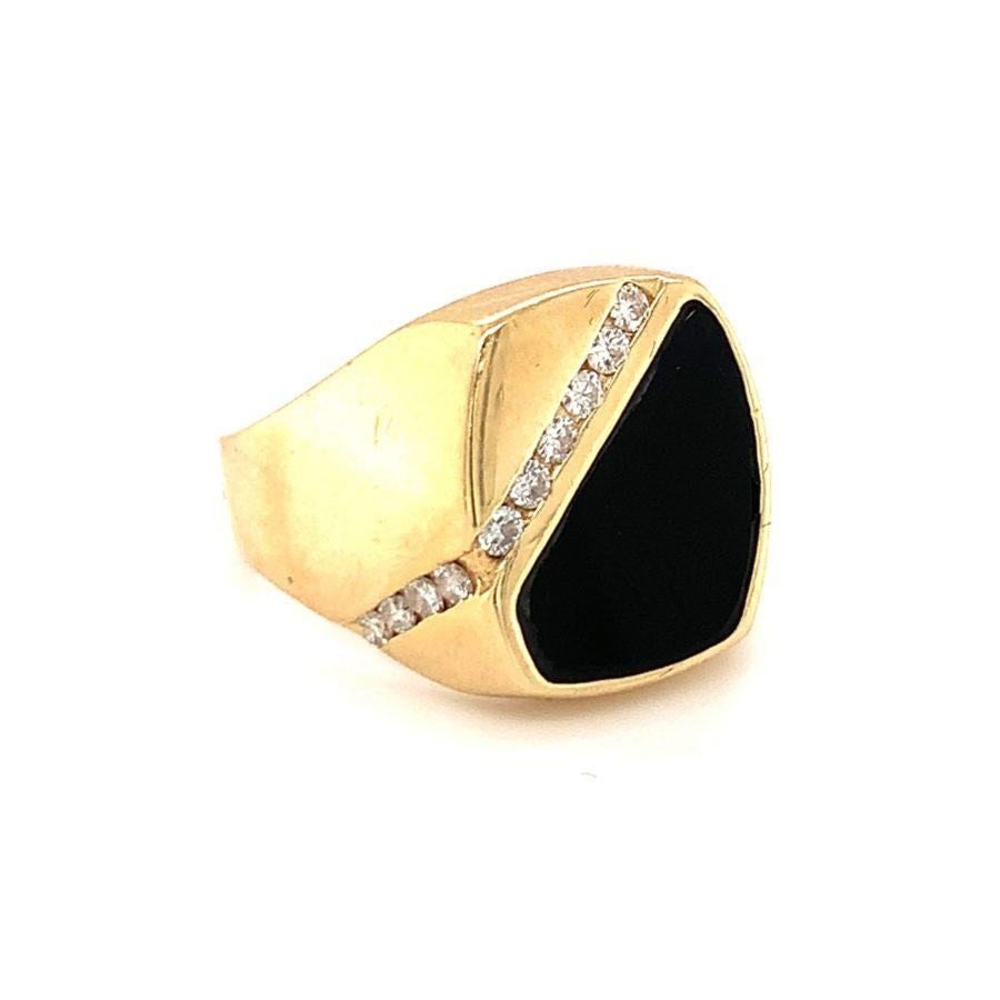 Glossy black onyx and diamond ring in 14K yellow gold with ten round brilliant cut diamonds totaling 0.35 ct. with F-G color and VS-1 clarity.

Stark, contrasting, polished.

Additonal information:
Metal: 14K yellow gold
Gemstone: Diamonds totaling
