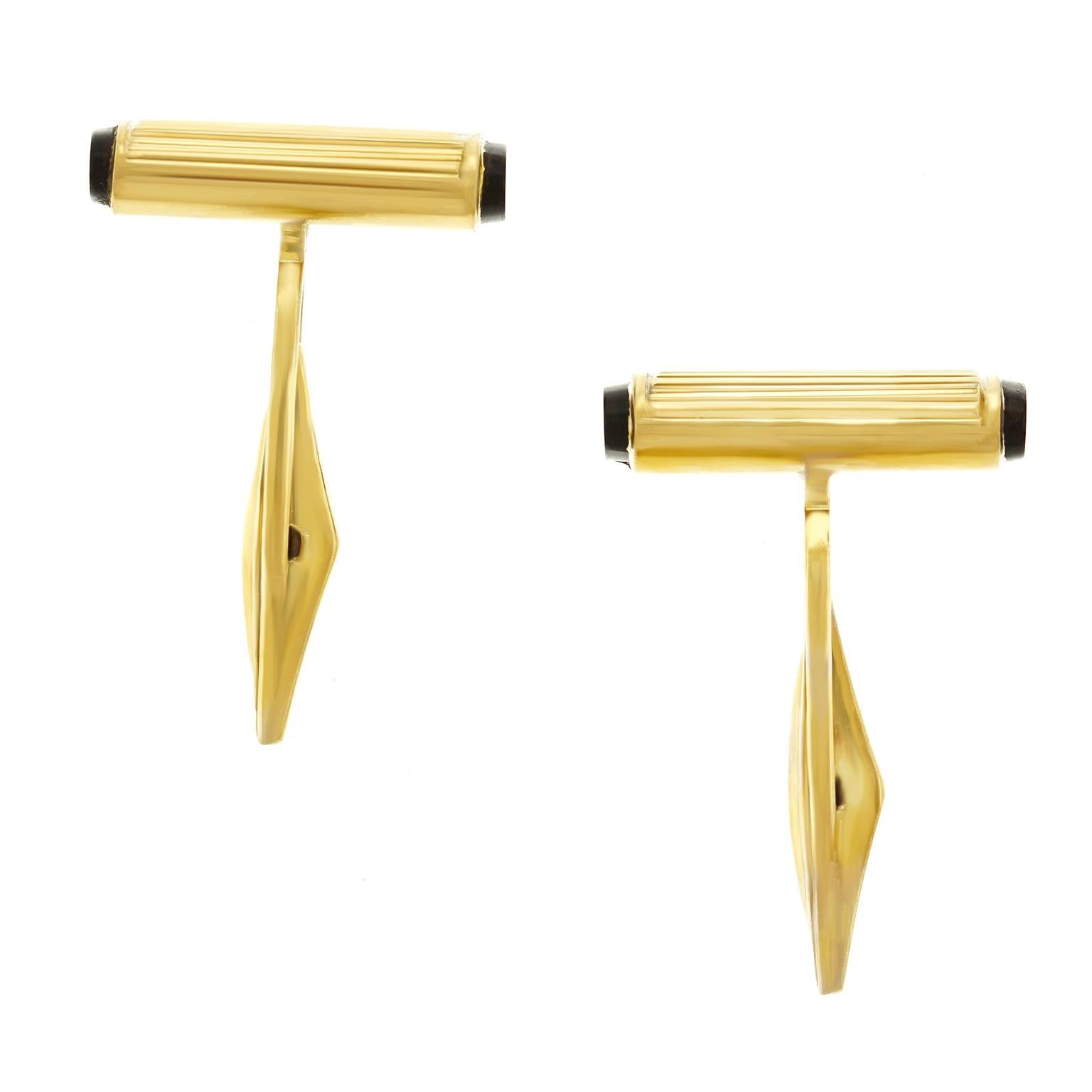 Circa 1950s, 14k, Germany. These modernist fifties cufflinks have that Deco all grown up vibe. Mix in some German industrial design and the look is understated sophistication. Finely fashioned, they are in excellent condition. 

Remark: “These