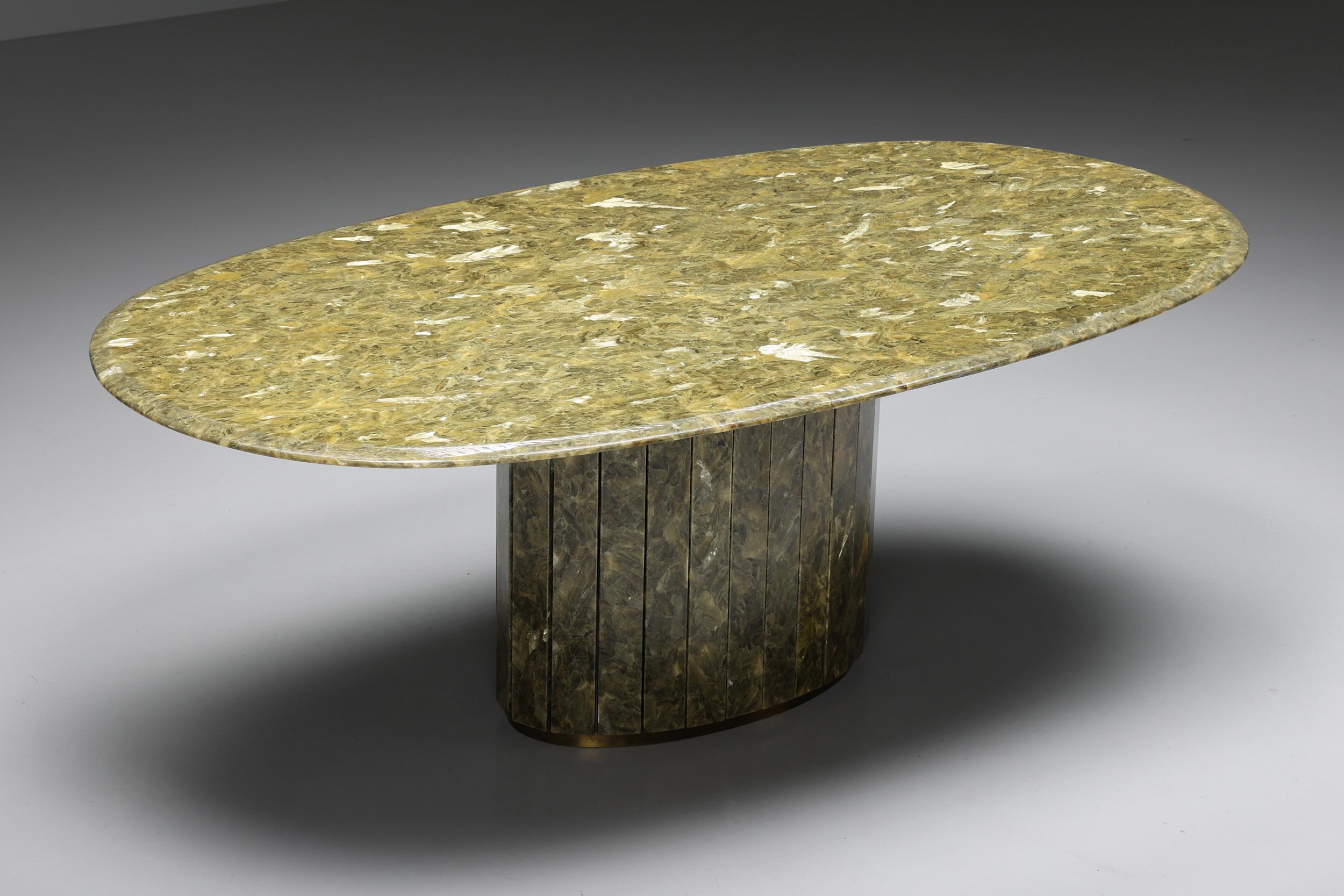 France; Jean Charles; Marble; Onyx; Gold leaf; Hollywood Regency; 1970's

Green onyx marble and brass dining table by Jean Charles. Made in France in the 1970s by a craftsman with an eye for details. The onyx and gold leaf combination make this a