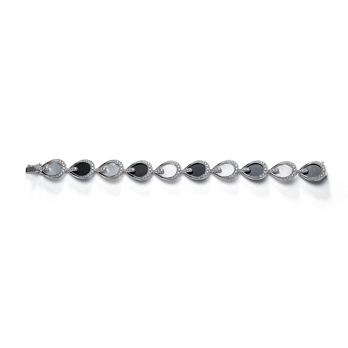 Bracelet in 18kt white gold set with 192 diamonds 2.34 cts, 5 mother-of-pearl 9.25 cts and 5 onyx 7.81 cts      