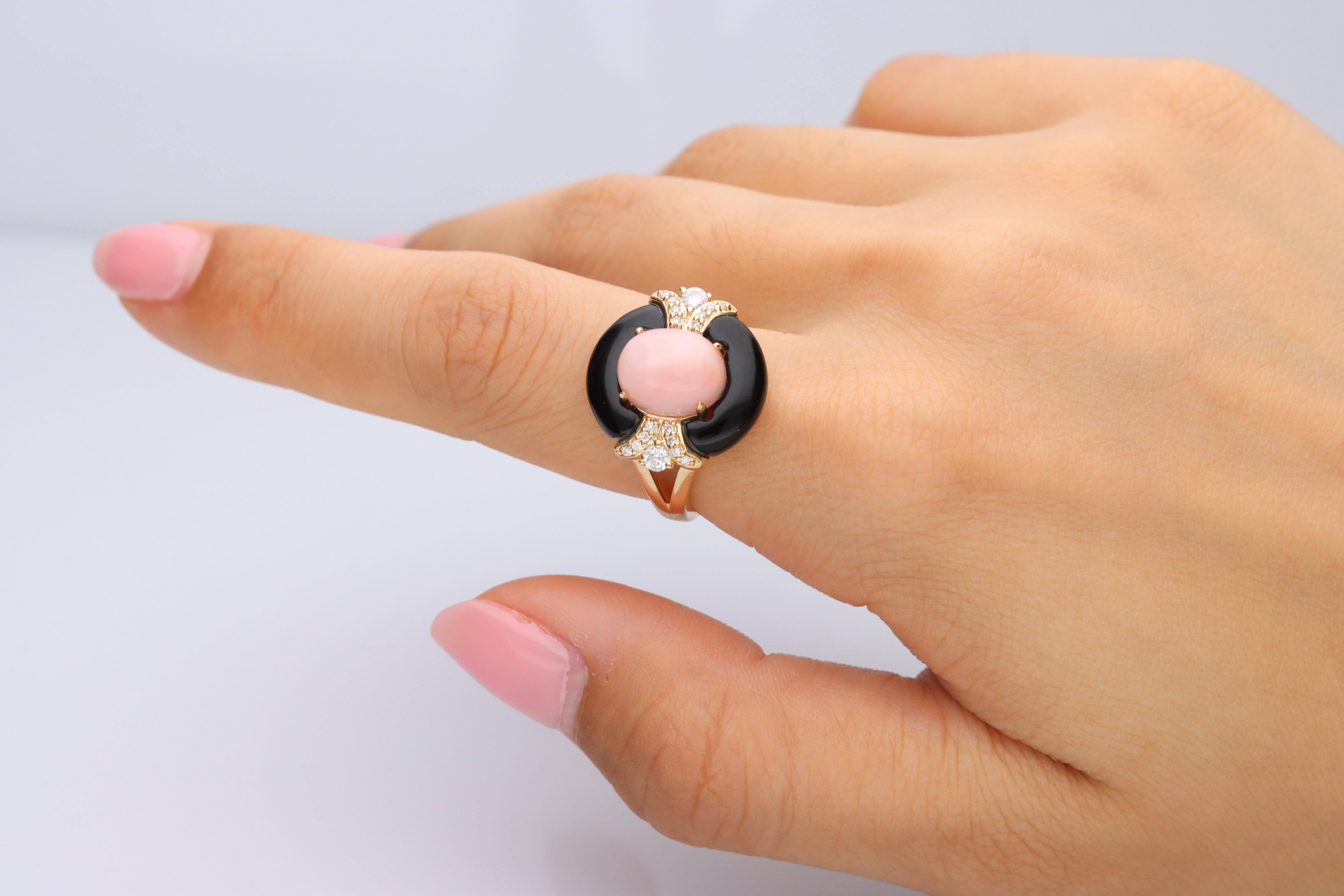Stunning, timeless and classy eternity Unique ring. Decorate yourself in luxury with this Gin & Grace ring. The 14k Yellow Gold jewelry boasts 8x10 mm oval cab Pink Opal (1pcs) 2.16 Carat, Free Size Onyx (2 pcs) 3.81 carat and Round-Cut Diamond (18