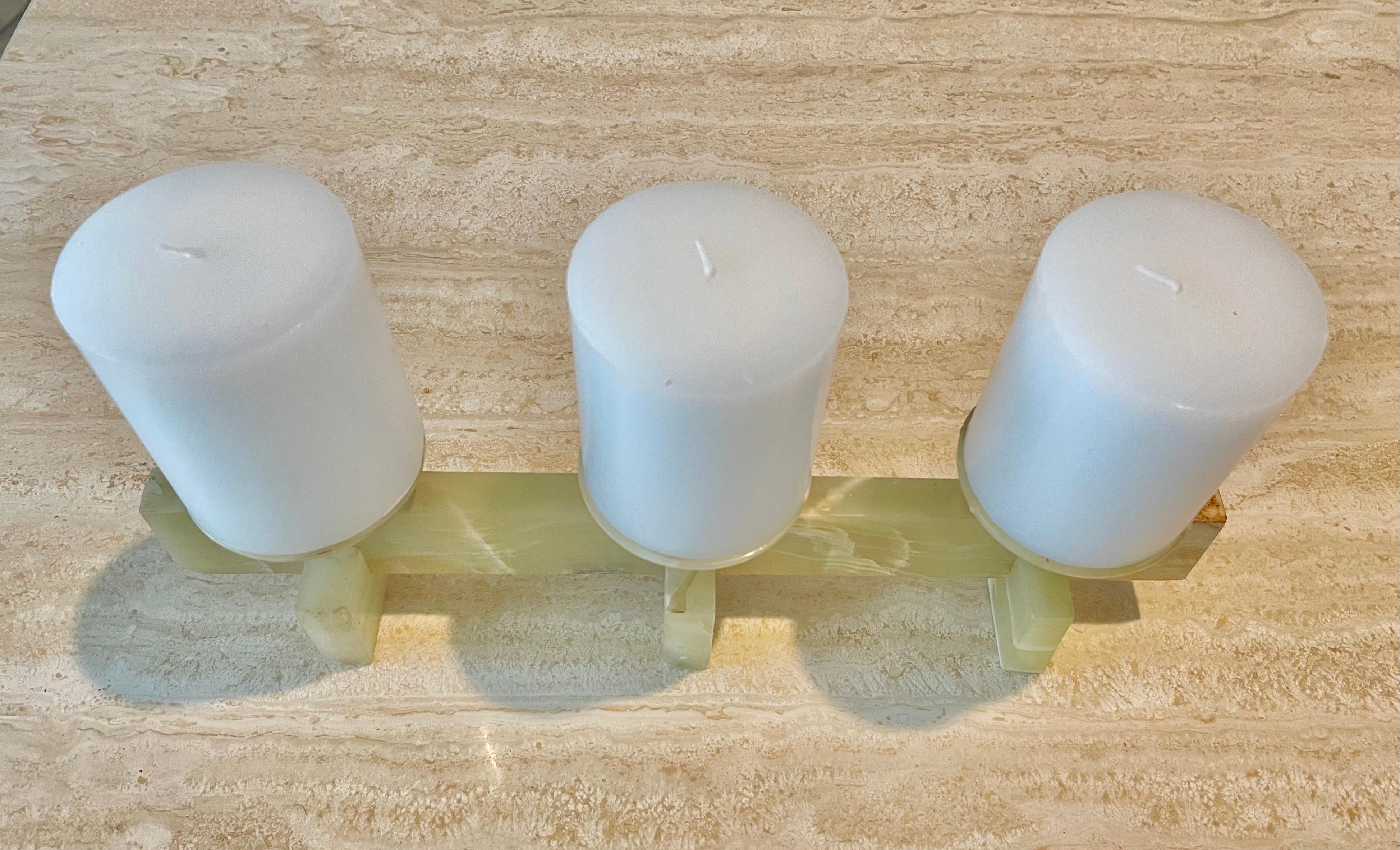 Decorative onyx candle holder.