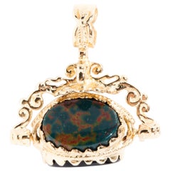 Onyx Carnelian and Bloodstone Cabochon Spinner Pendant in 9 Carat Gold