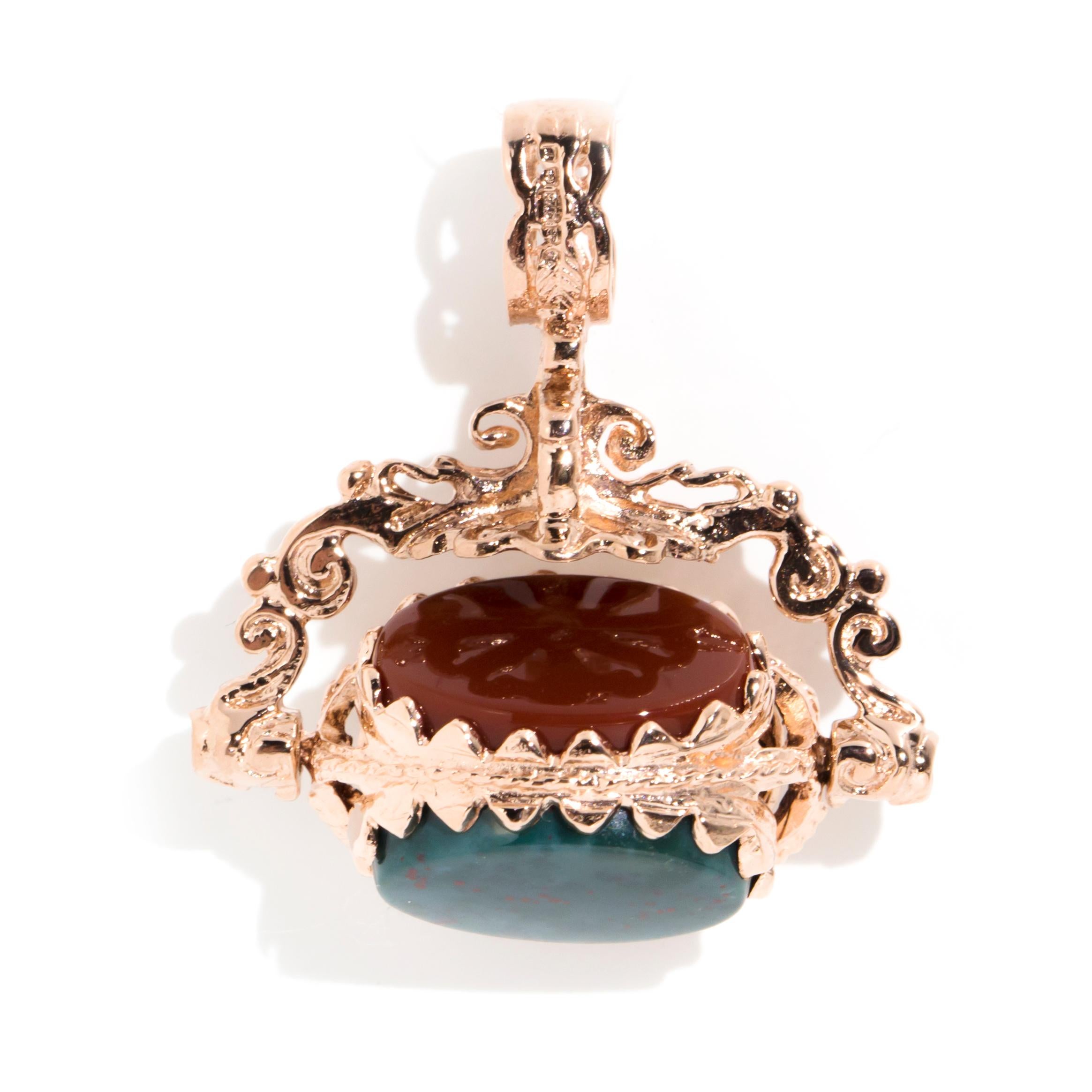 Lovingly crafted in 9 carat rose gold, this vintage spinner pendant features a handsome combination of bloodstone, carnelian, and onyx gemstones mounted in a unique spinning pendant. We have named this wondrous piece The Florian Pendant. She is a