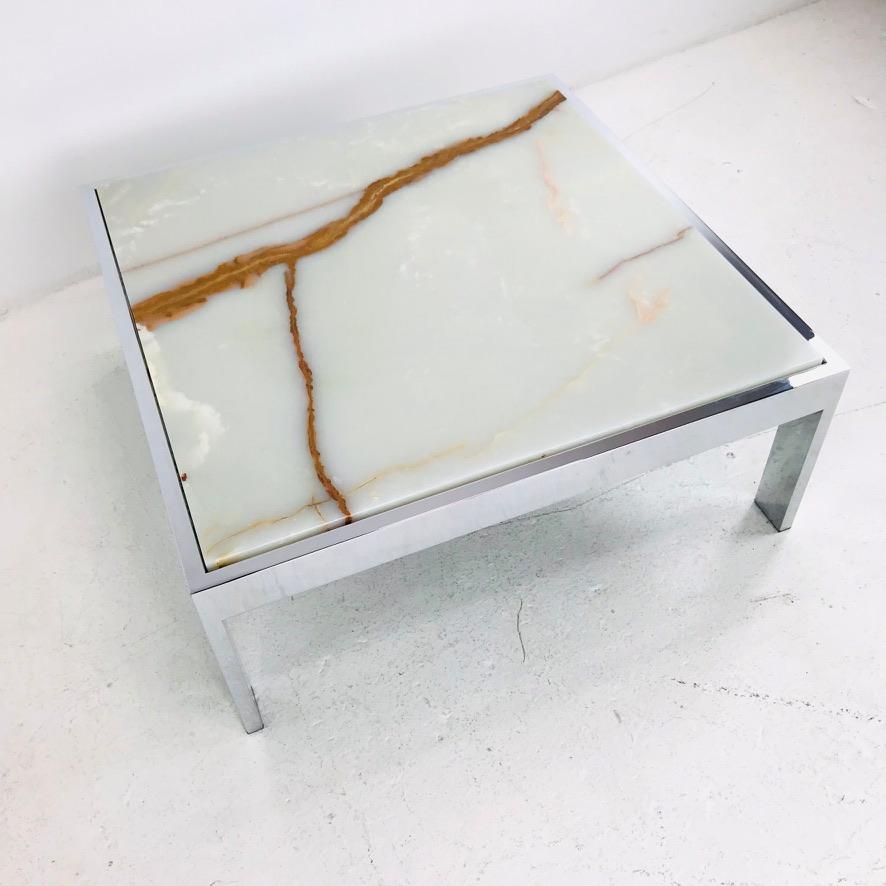 Beautiful modern coffee table features chromed steel frame with onyx top. By Leon Rosen for Pace, 1970s.