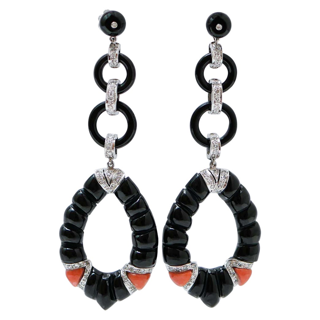 Onyx, Coral, Diamonds, Platinum Earrings.