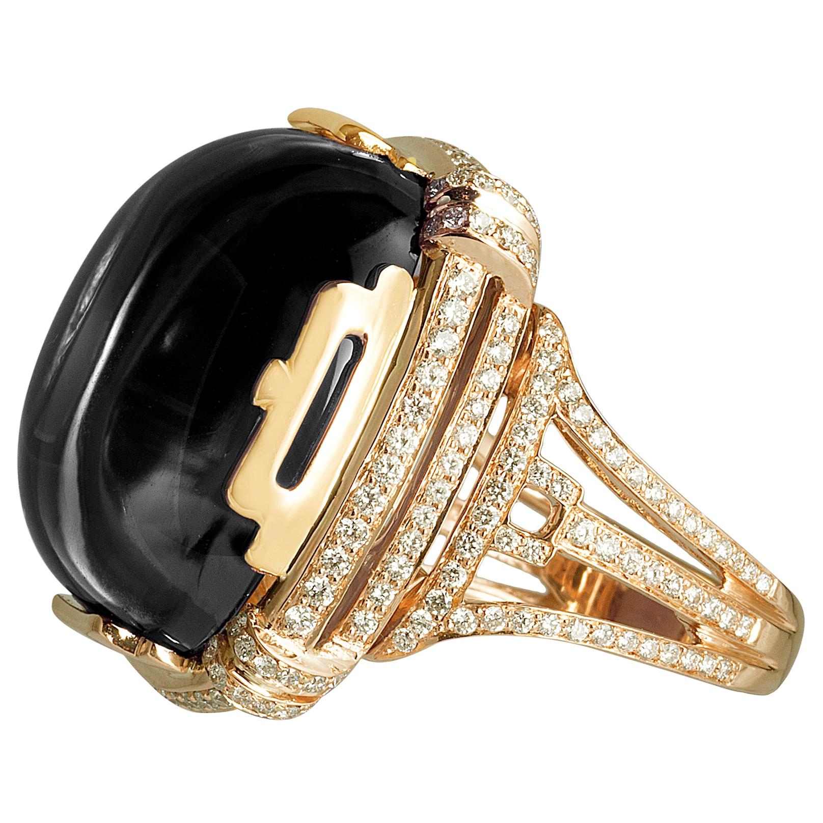 Ring mit Onyx und Diamant im Kissen-Cabochon-Schliff