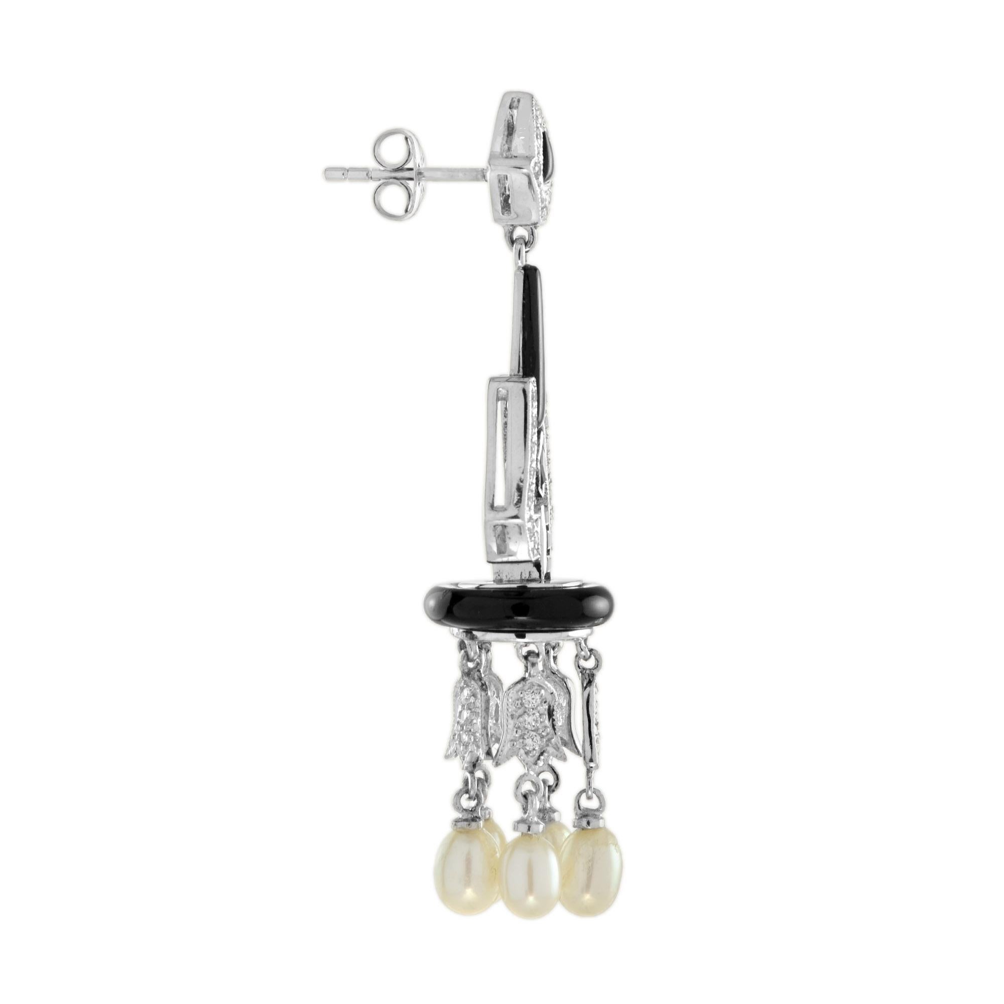 Taille poire Boucles d'oreilles chandelier de style Art déco en or blanc 18 carats, onyx, diamants et perles en vente