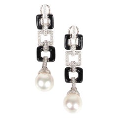 Onyx-, Diamant- und Perlenohrringe