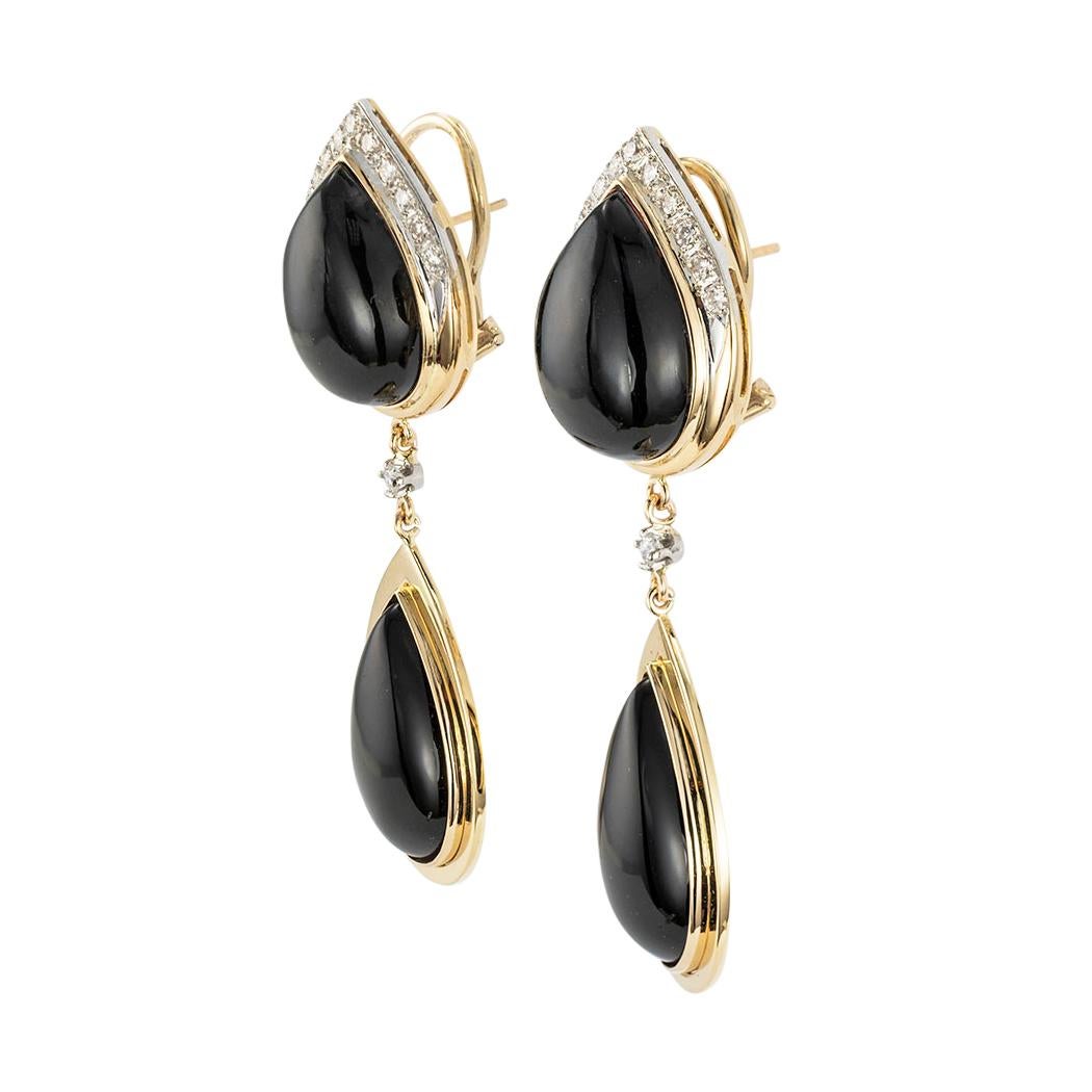 Estate onyx diamond and yellow gold drop earrings circa 1980.  Clear and concise information you want to know is listed below.  Contact us right away if you have additional questions.  We are here to connect you with beautiful and affordable