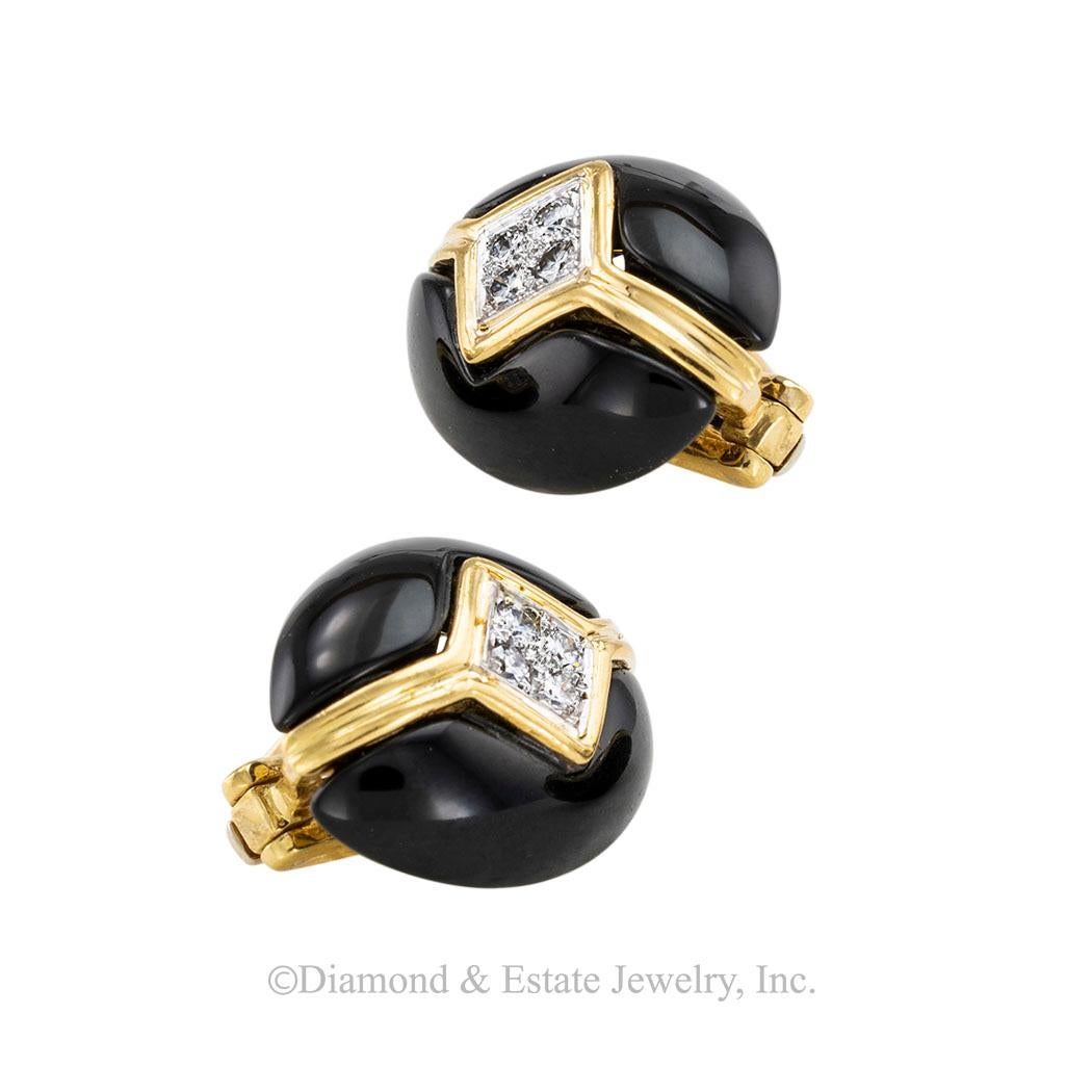 Black onyx diamond and yellow gold clip-on earrings circa 1980.  

Contact us right away if you have additional questions.  We are here to connect you with beautiful and affordable antique and estate jewelry.

SPECIFICATIONS:

GEMSTONES:  black