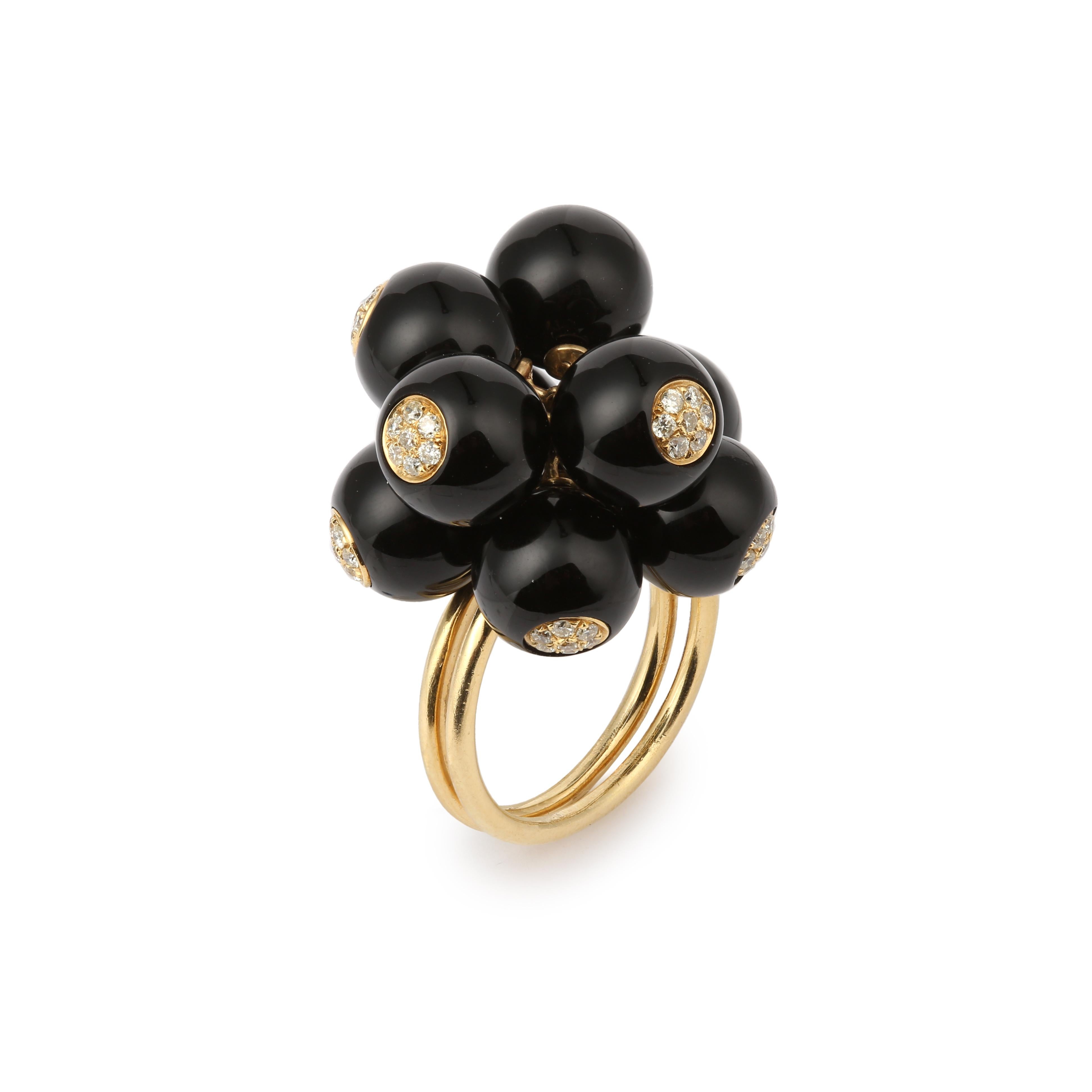 Yellow gold ring set with 9 onyx bells. Each articulated bell moves on the finger and is paved with 7 diamonds.

Total estimated diamond weight: 0.60 carats

Dimensions : 24 x 25.40 x 20.21 mm (0.945 x 1 x 0.795 inch)

Finger size : 56 (US : 7