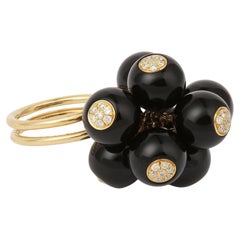 Grelots-Ring aus 18 Karat Gelbgold mit Onyx und Diamanten