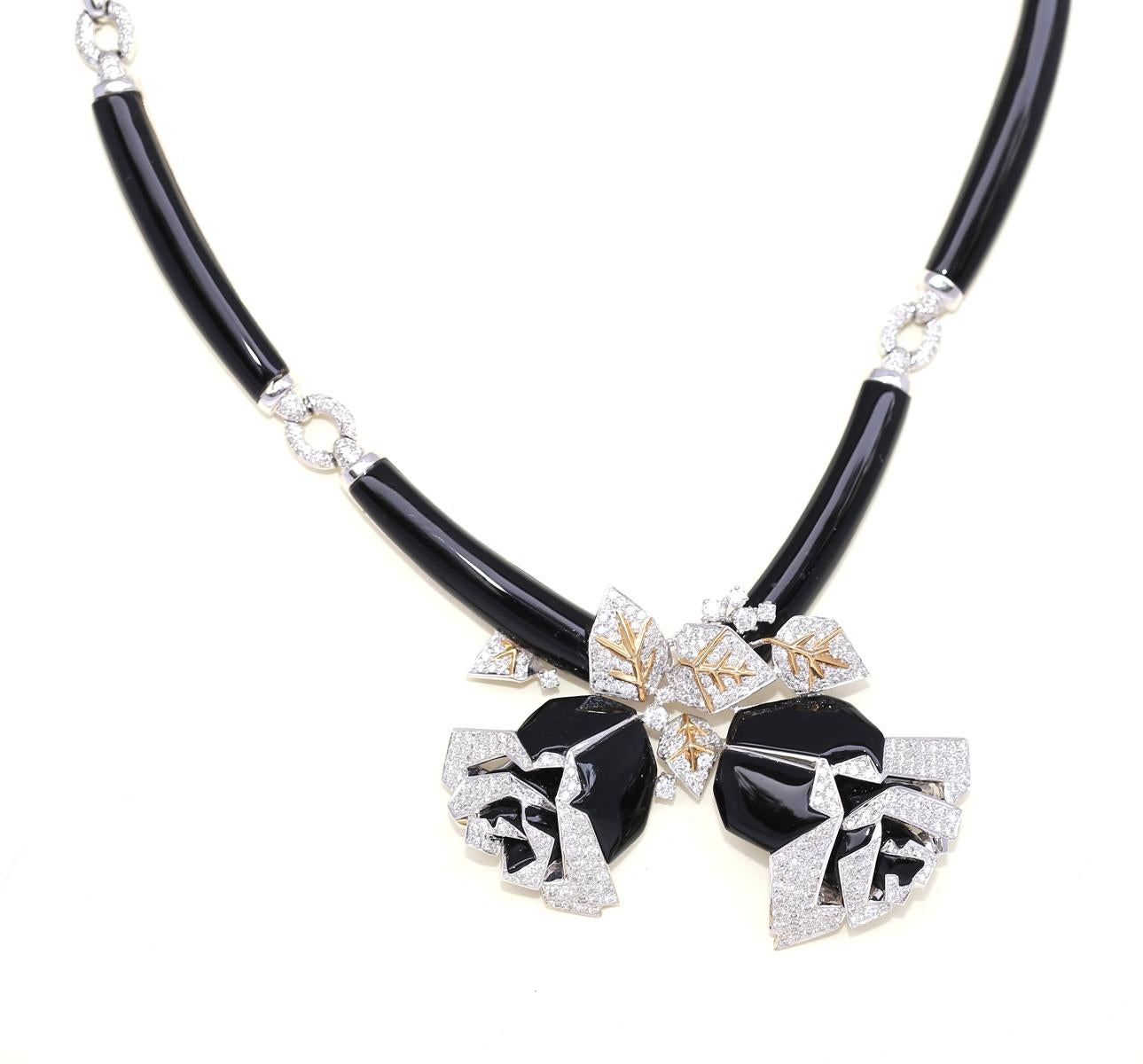 Link Necklace of Onyx on 18K White Gold with wonderfully sculptured black roses also with onyx and Diamonds. 

Stamped 18K 750 Gold.

Necklace sits perfectly on the body. Elegant and super 90es style. Just a perfect gift for the one in the know.